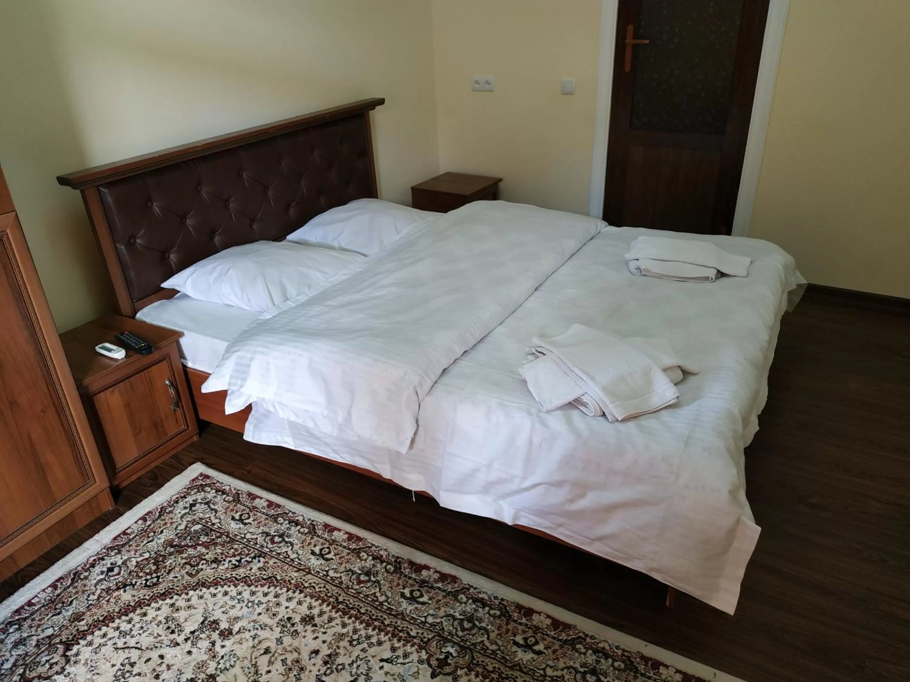 Bed in Tilyakori Hotel