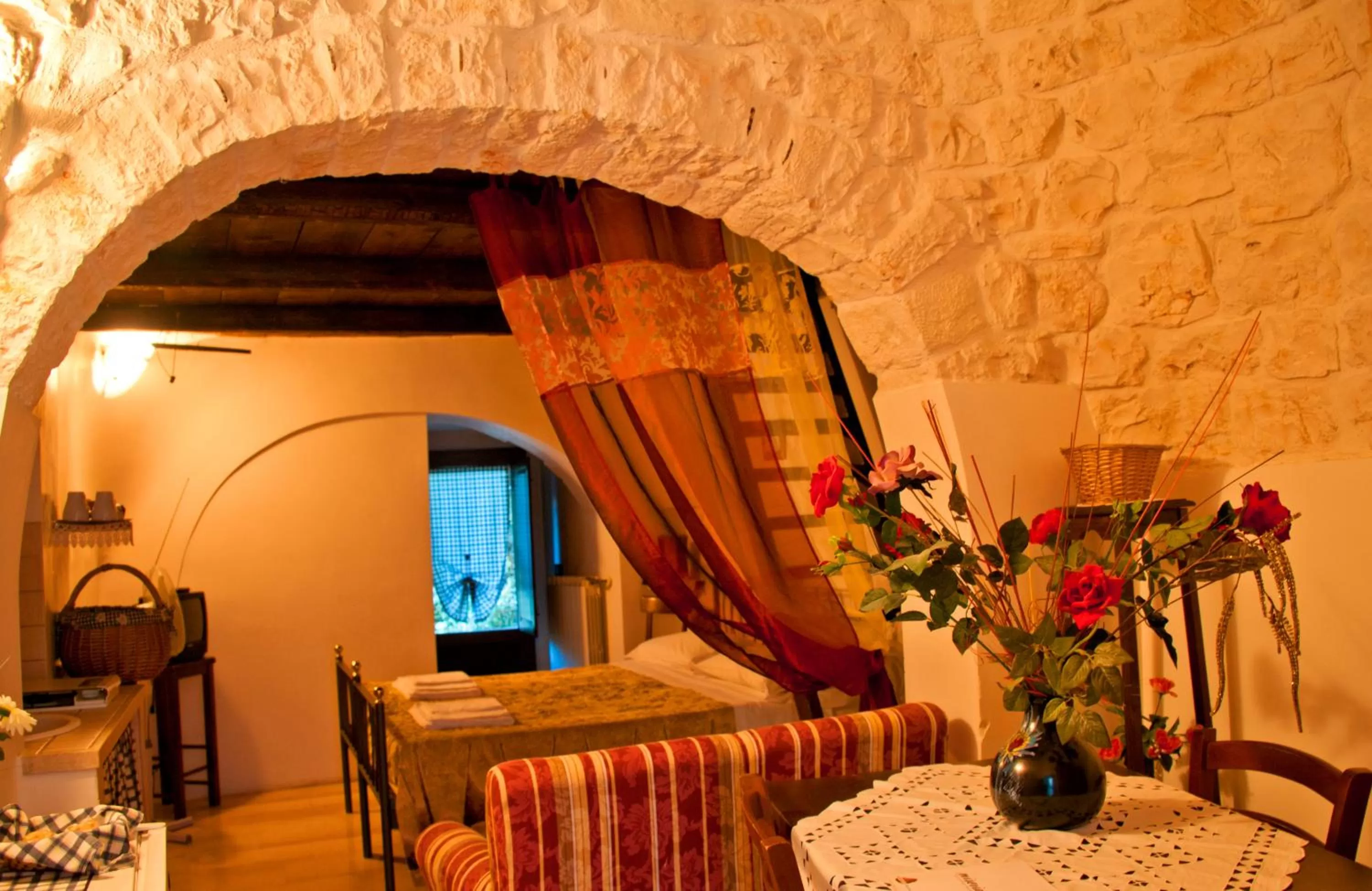 Photo of the whole room, Bed in Giardino Dei Trulli