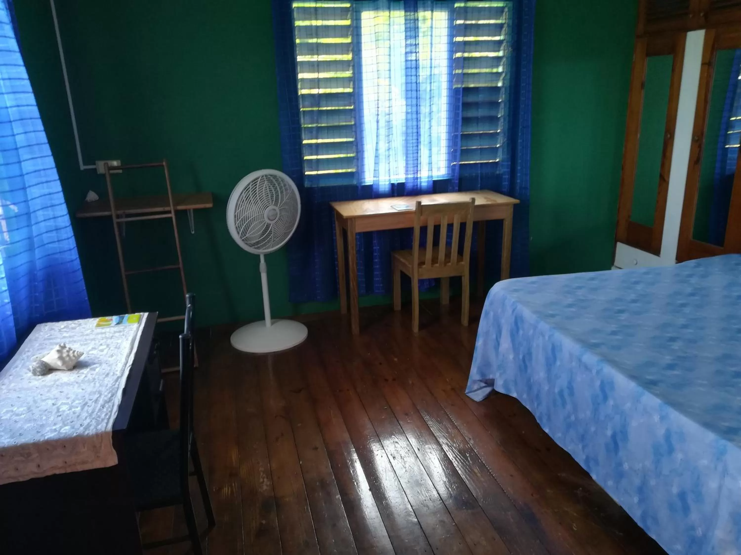 Bed in TOGA GUEST HOUSE