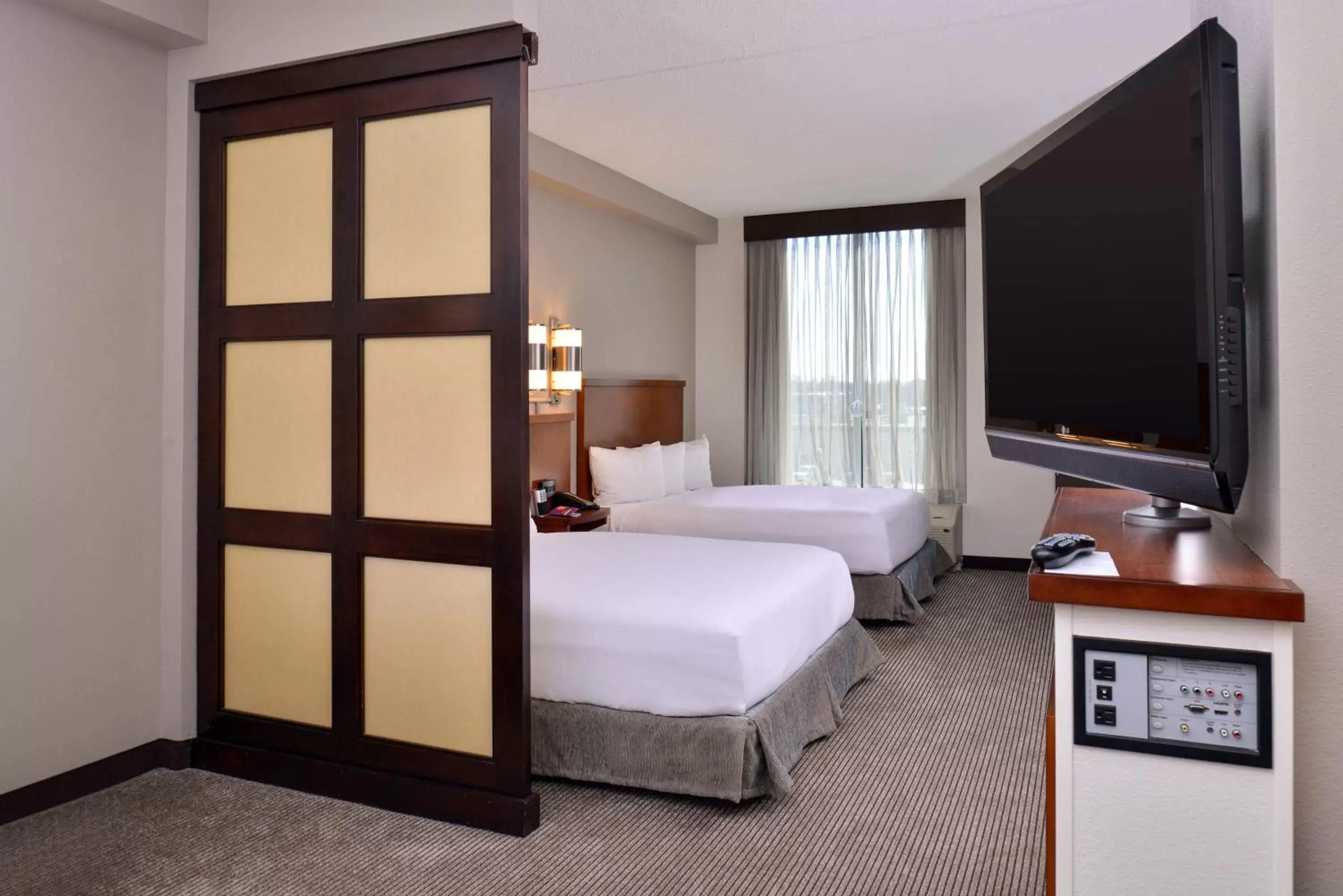 Queen Room with Two Queen Beds and Sofa Bed - High Floor in Hyatt Place Garden City Queen Room with Two Queen Beds and Sofa Bed - High Floor in Hyatt Place Garden City