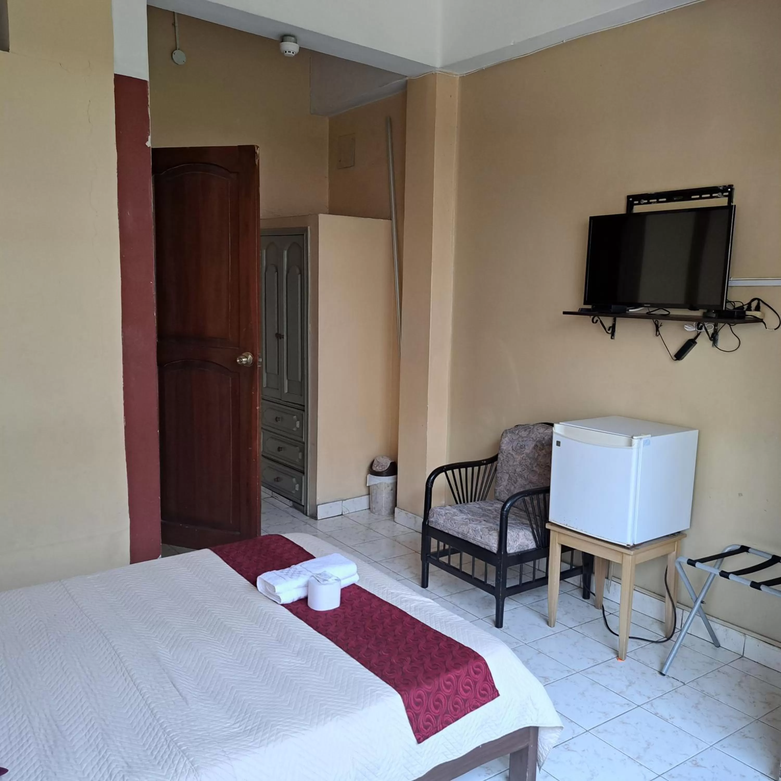 Photo of the whole room, TV/Entertainment Center in Atlantic Suites Hotel