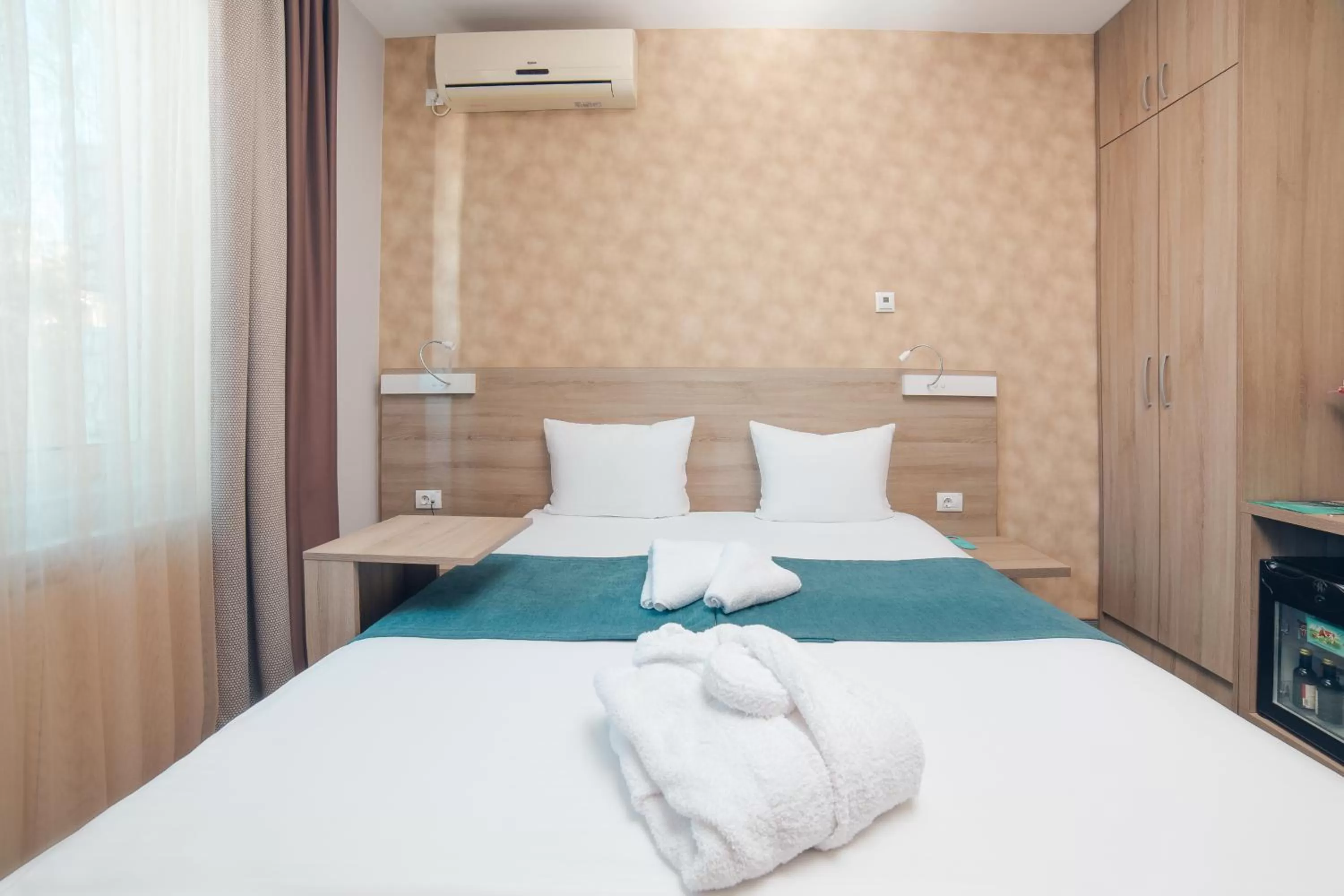 Bed in Garni Hotel Mint