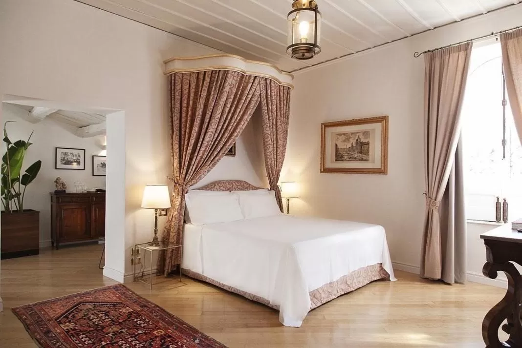 Bed in Palazzo Cherubini-Pools & Wellness