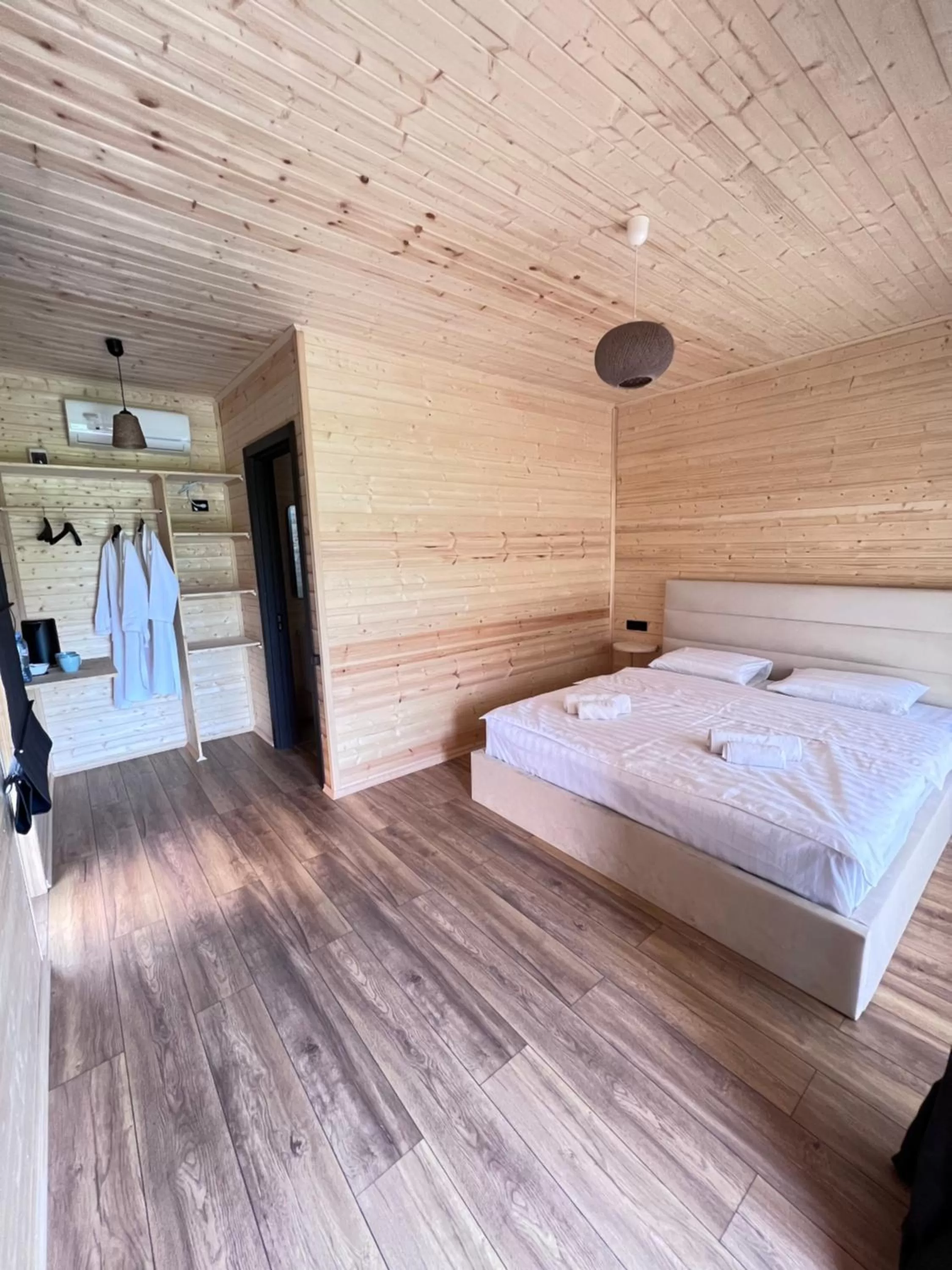 Bed in Chubini Winery & Cabins