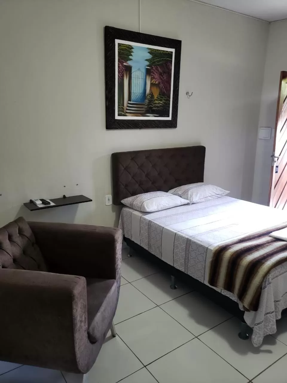 Bed in Pousada e Posto Amigão