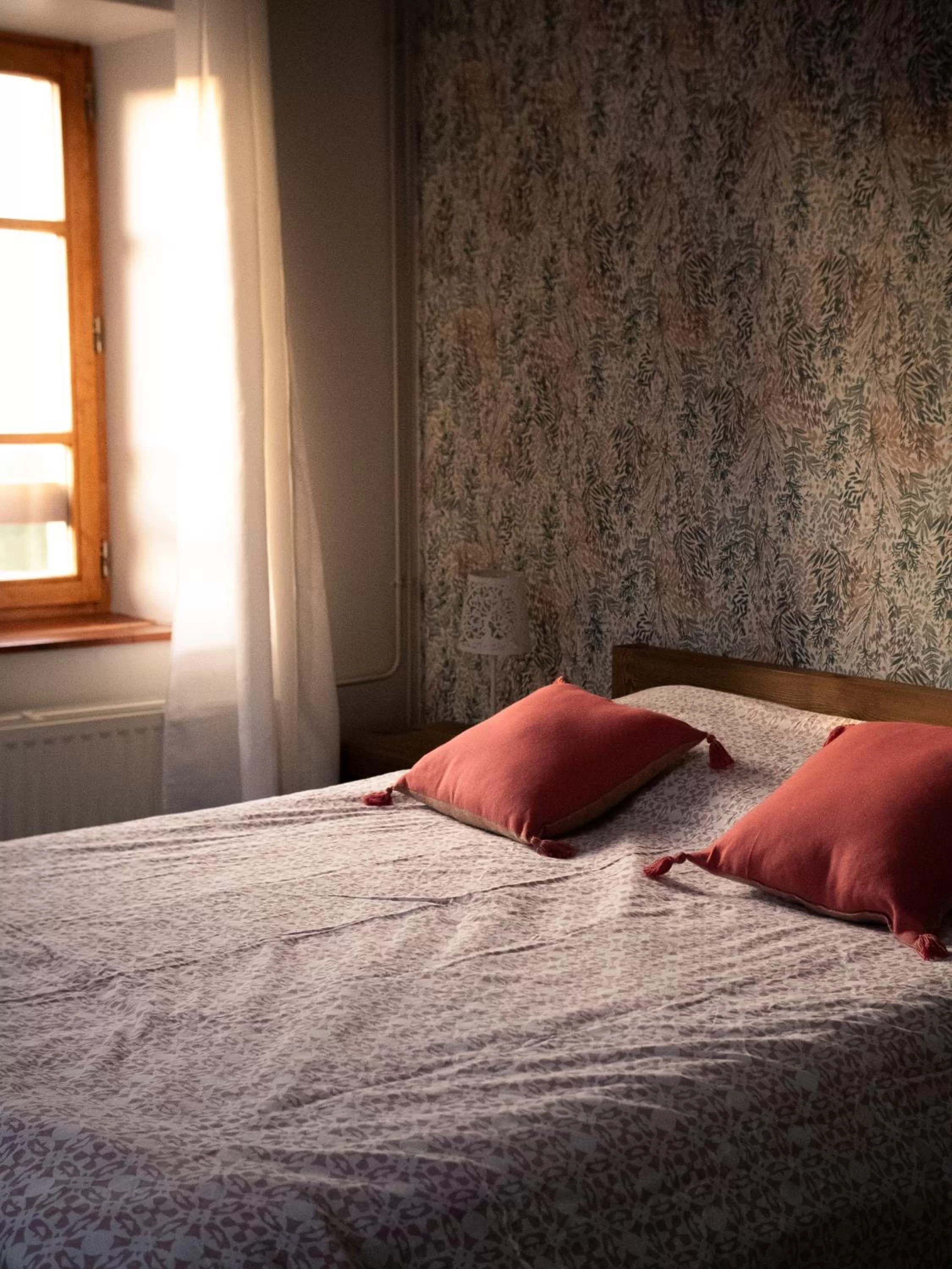 Bed in Chambre d'hôte de L'Auberge de la Fruitière