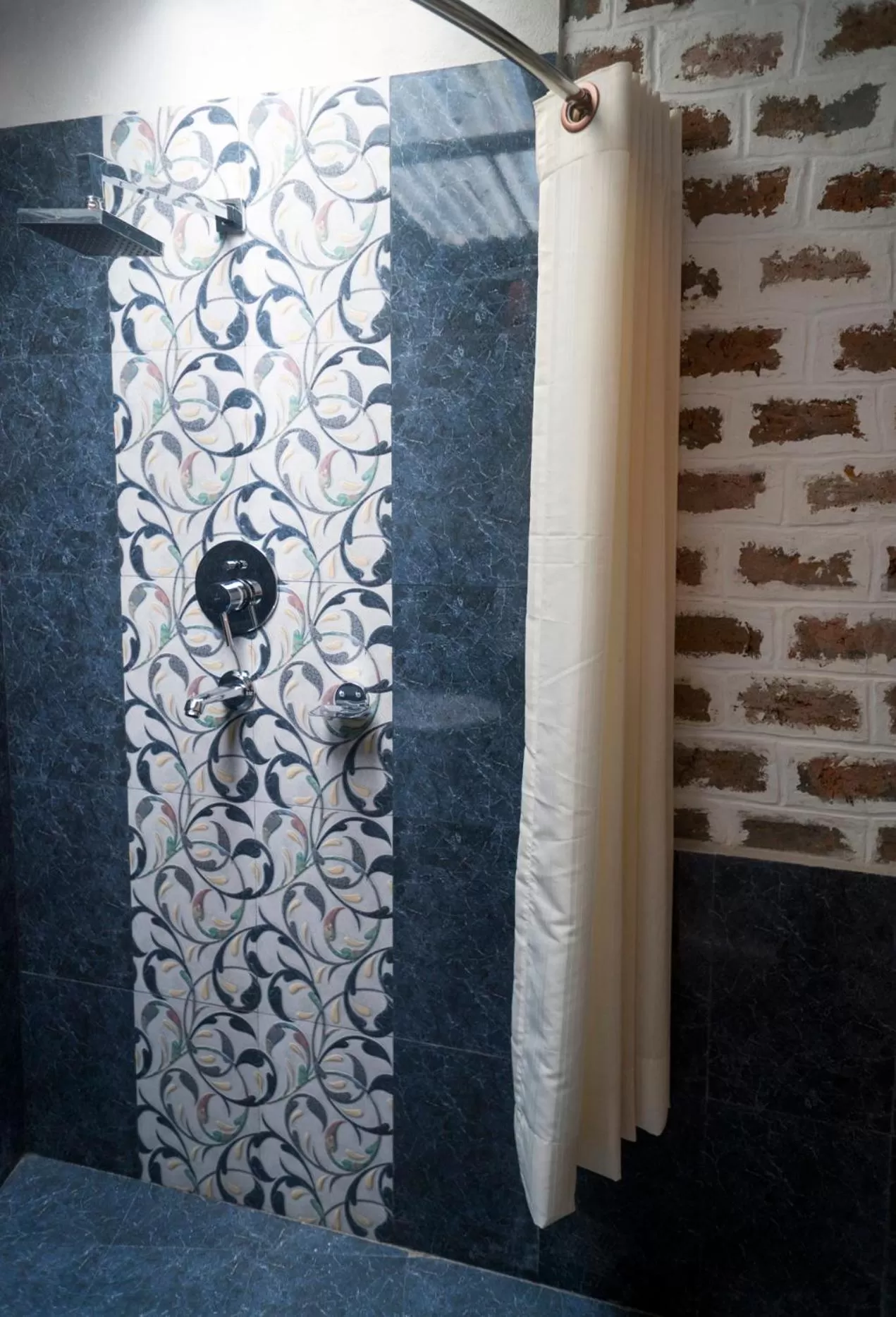 Bathroom in Omana Hotel