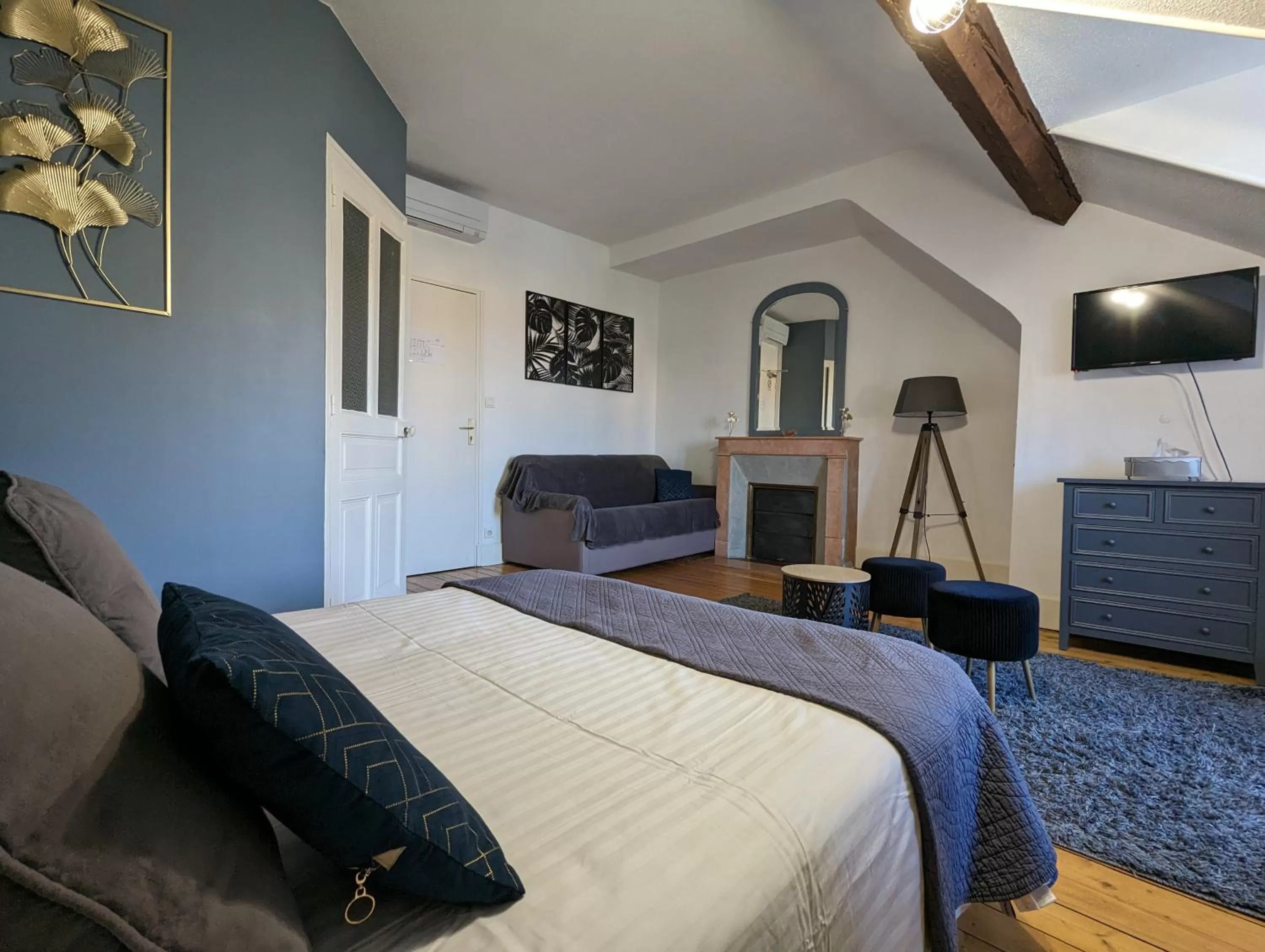 Photo of the whole room, Bed in Logis Hotel La Tourelle du Beffroi