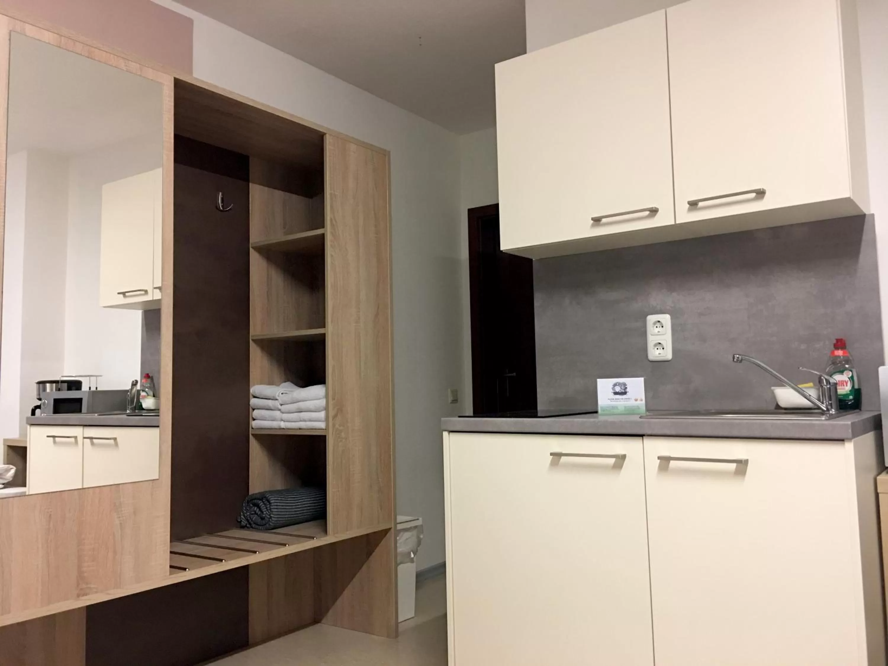 Photo of the whole room, Kitchen/Kitchenette in Hana Aparthotel