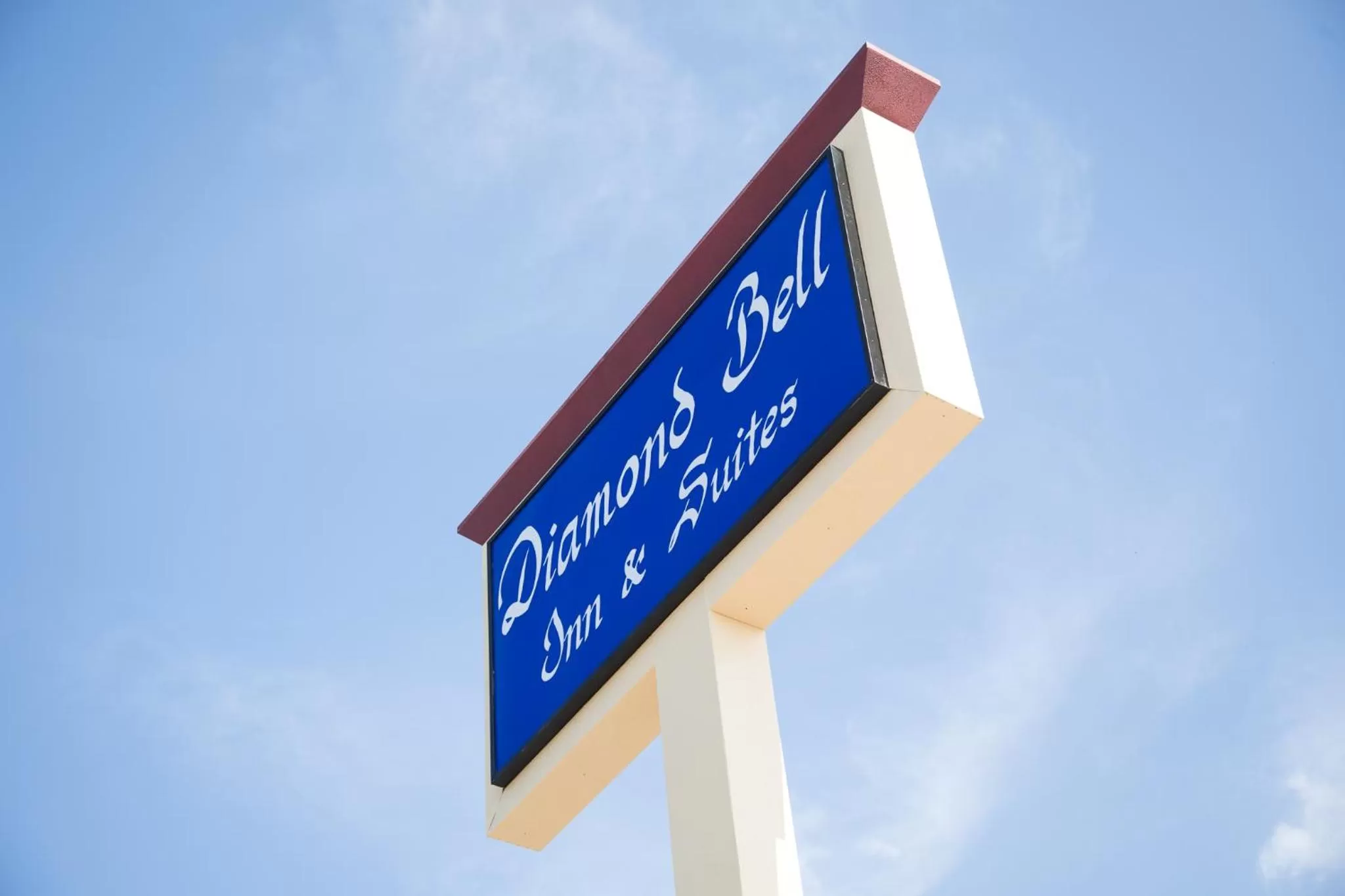 Property logo or sign in Diamond Bell Inn & Suites