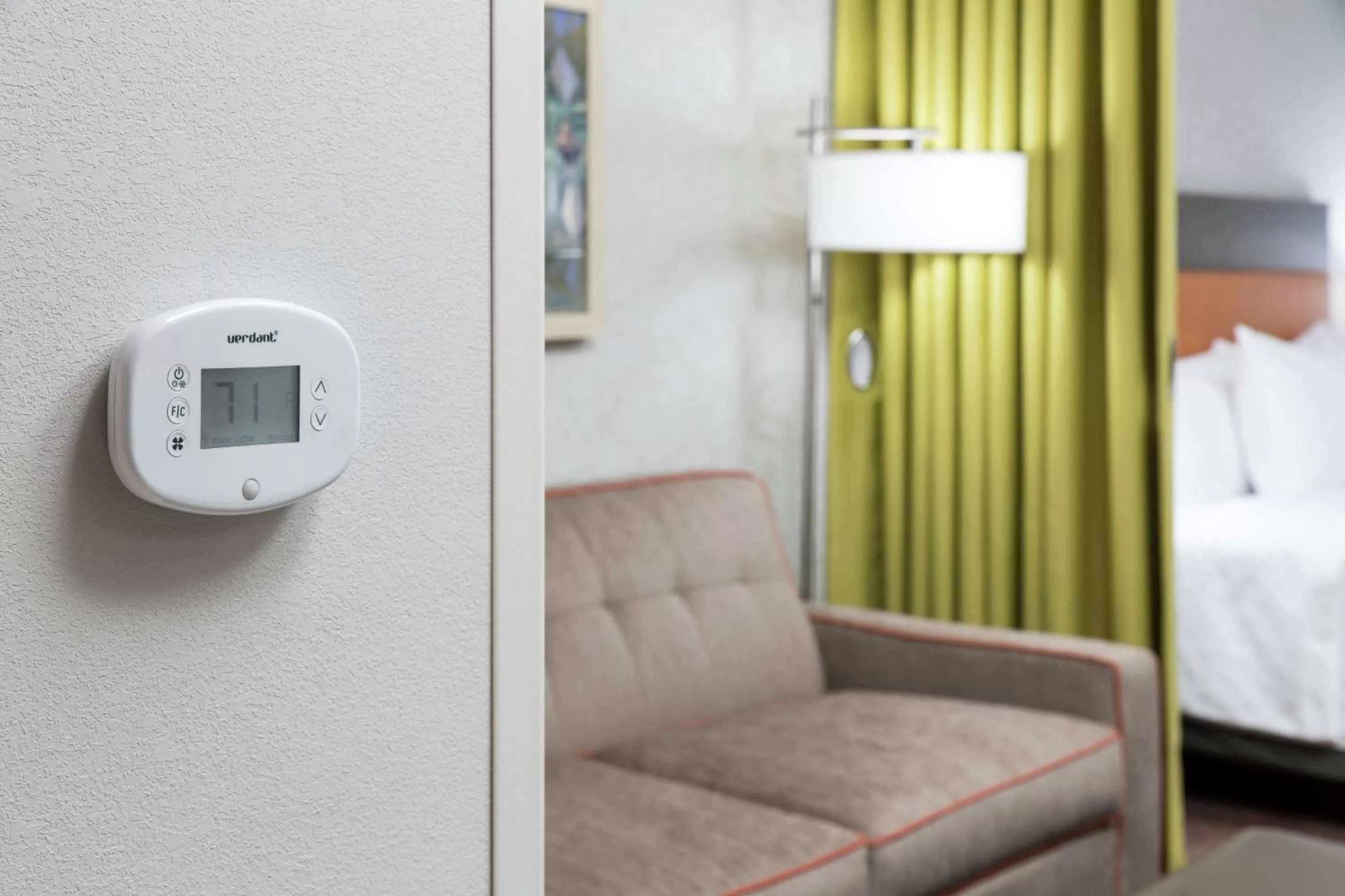 Living room, Bed in Home2 Suites By Hilton Orlando Airport