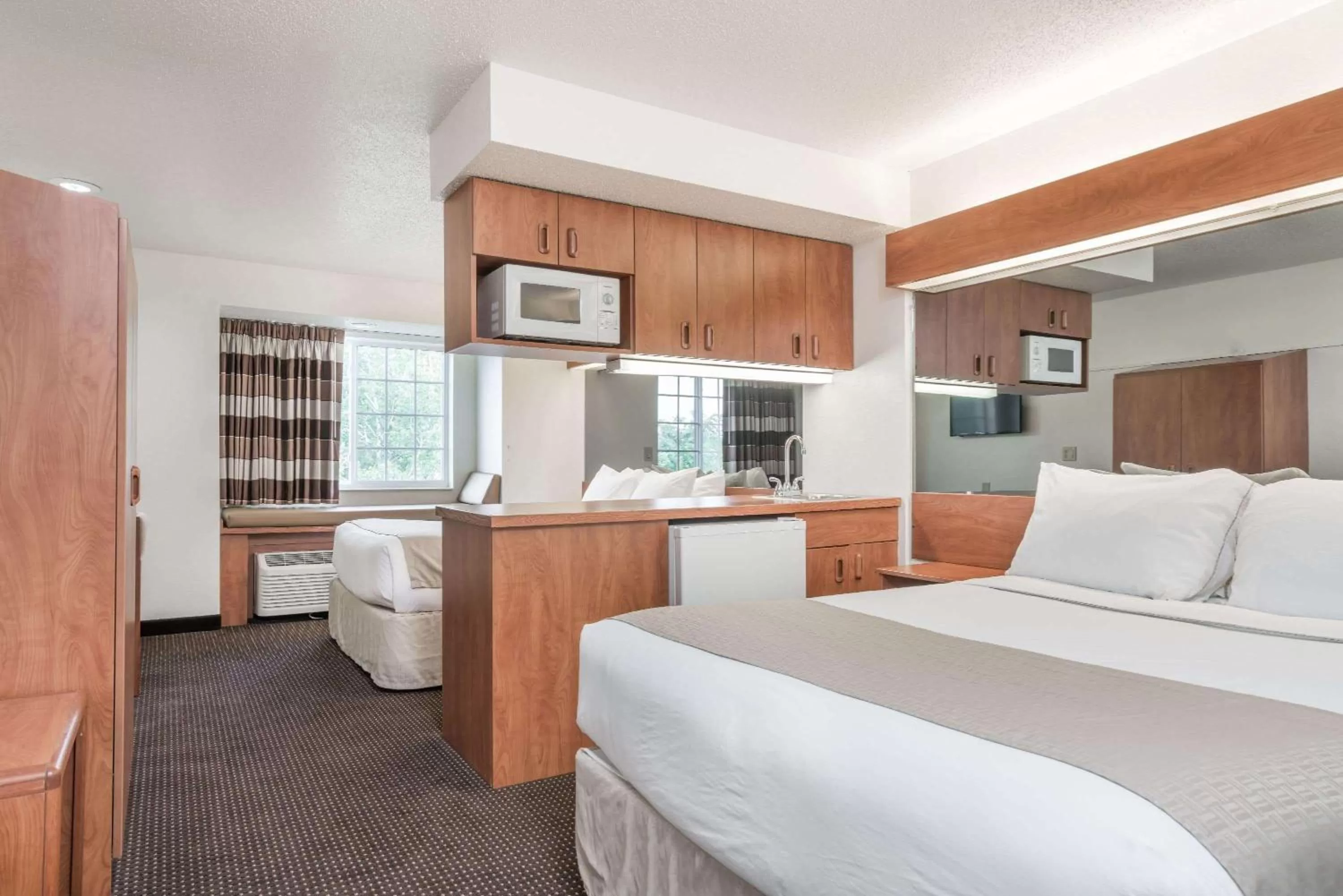 Photo of the whole room, Bed in Microtel Inn & Suites by Wyndham Rice Lake