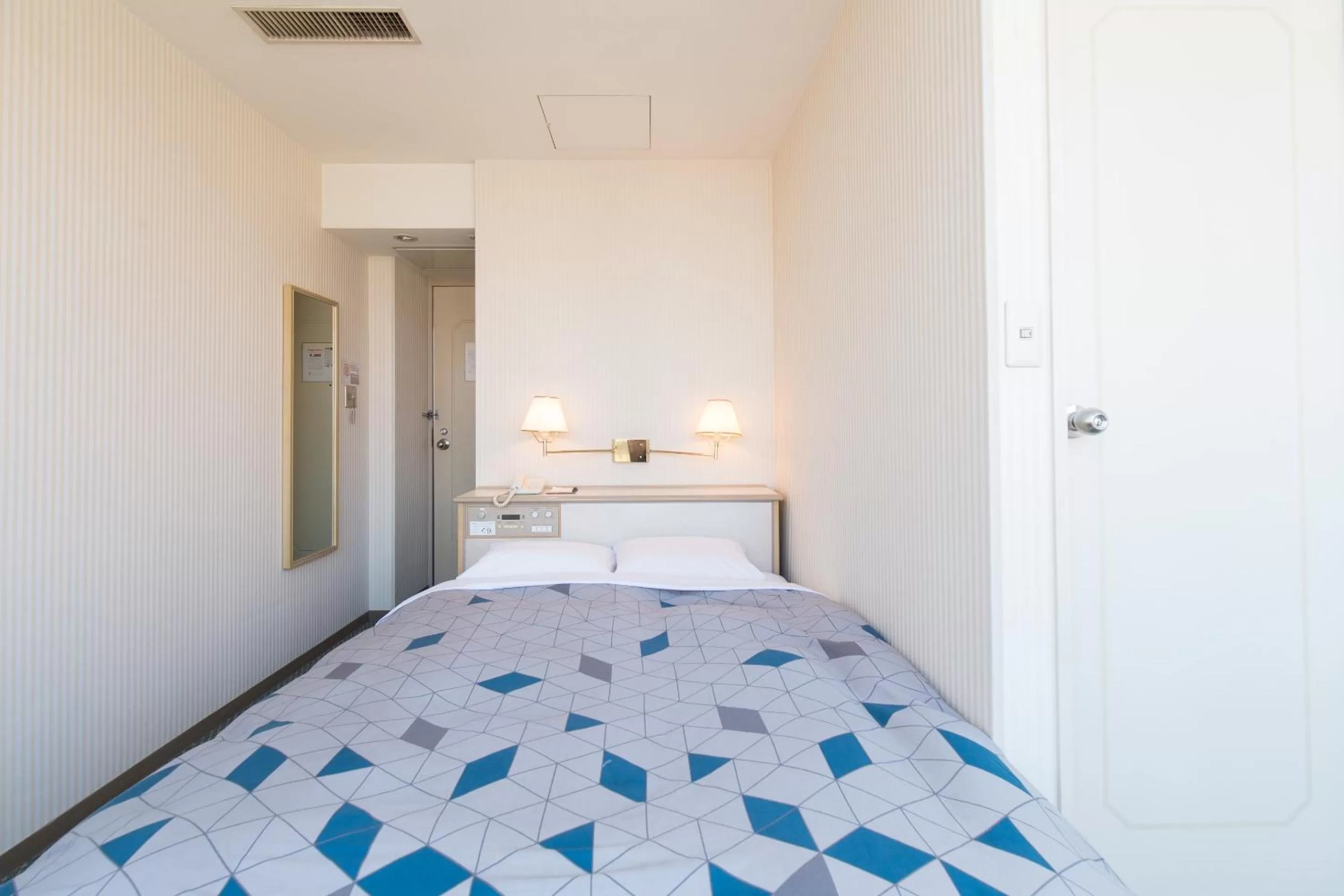 Photo of the whole room, Bed in Tabist Hotel Tetora Kitakyushu