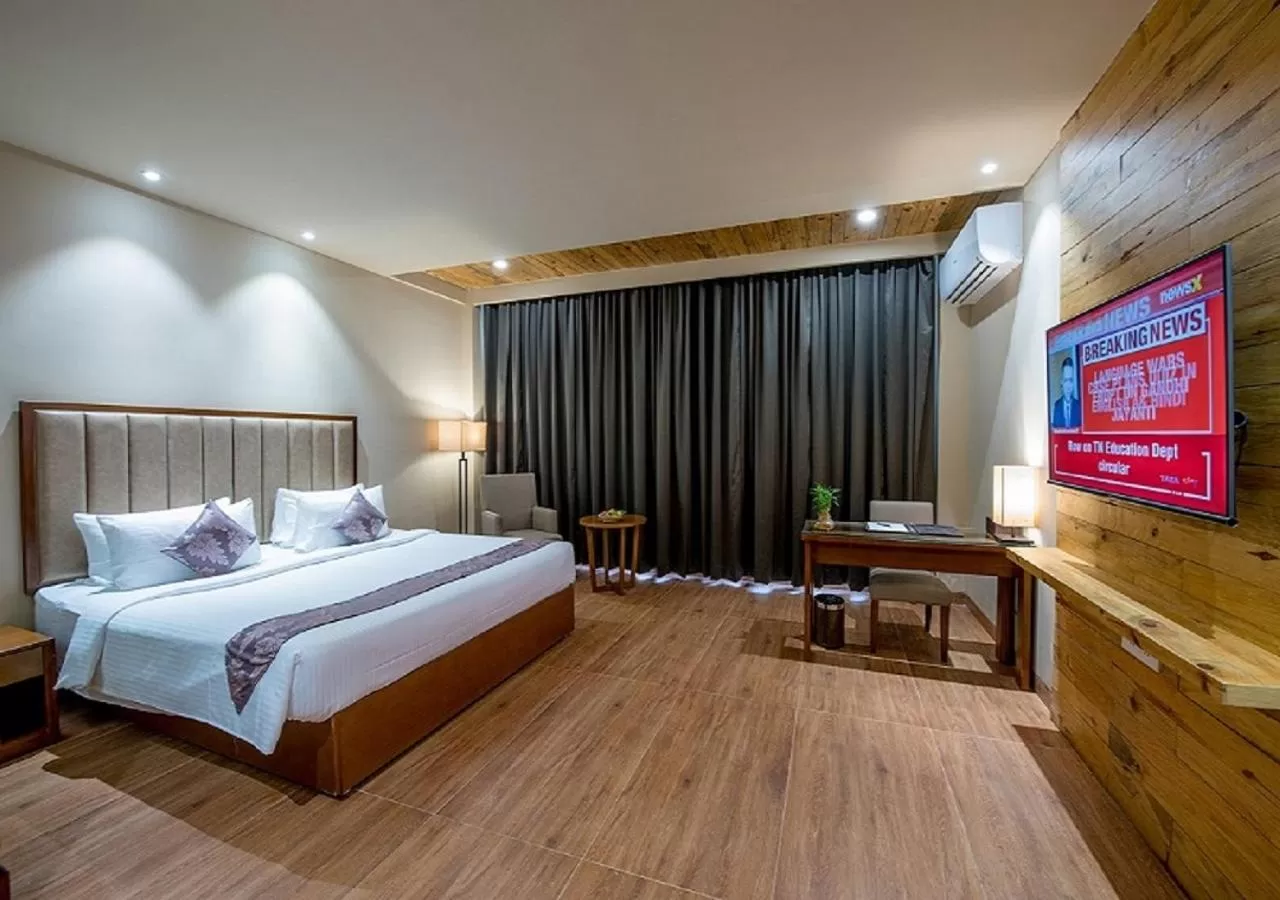 Photo of the whole room, Bed in Hotel Cachar Club