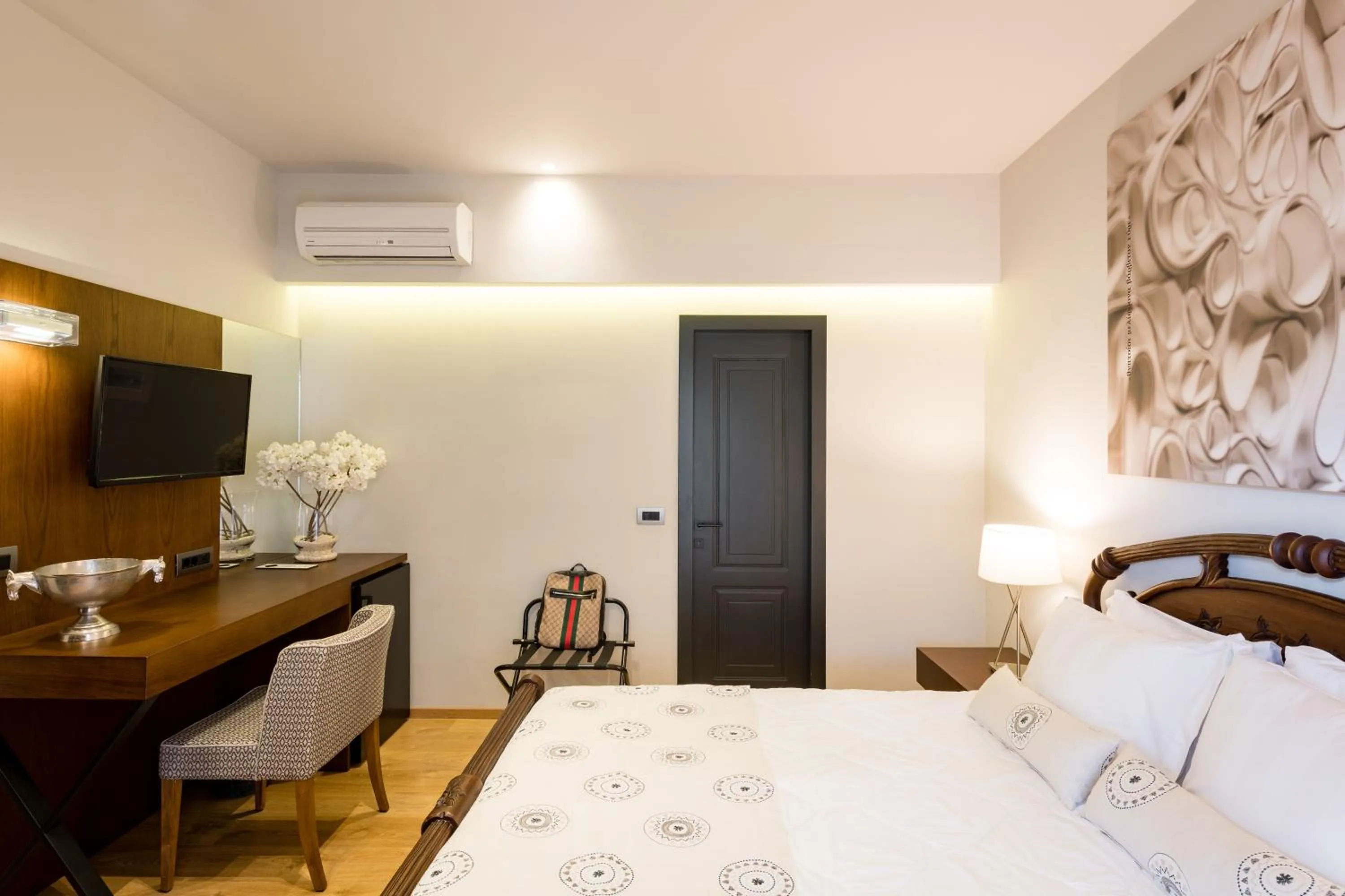 Bed in Anthemion Suites and Villas