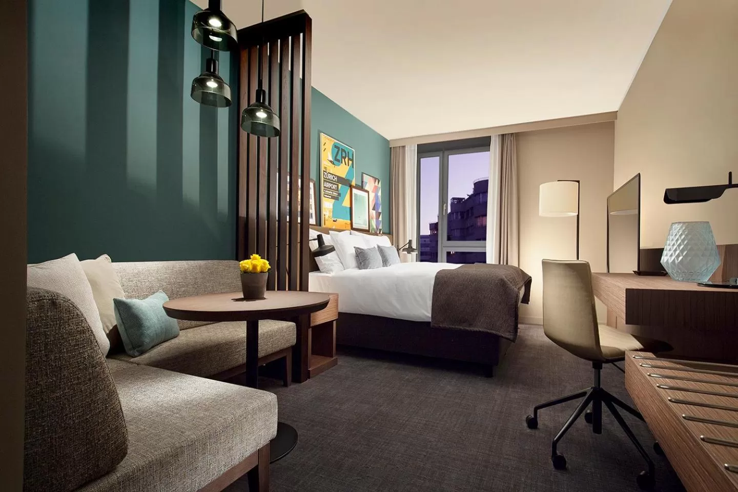 Seating area, Bed in Acasa Suites Zurich Oerlikon