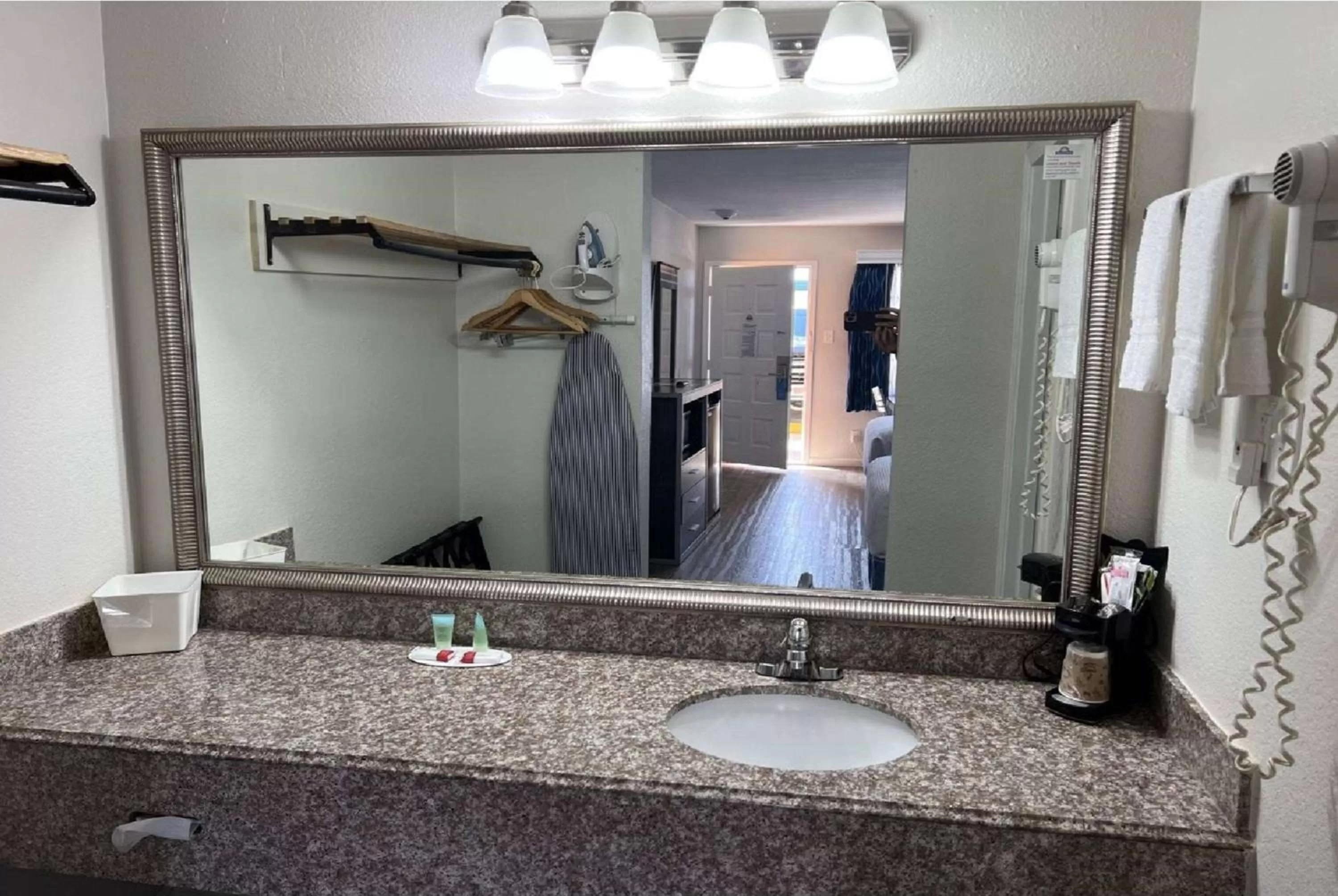 Bathroom in Days Inn by Wyndham Orange