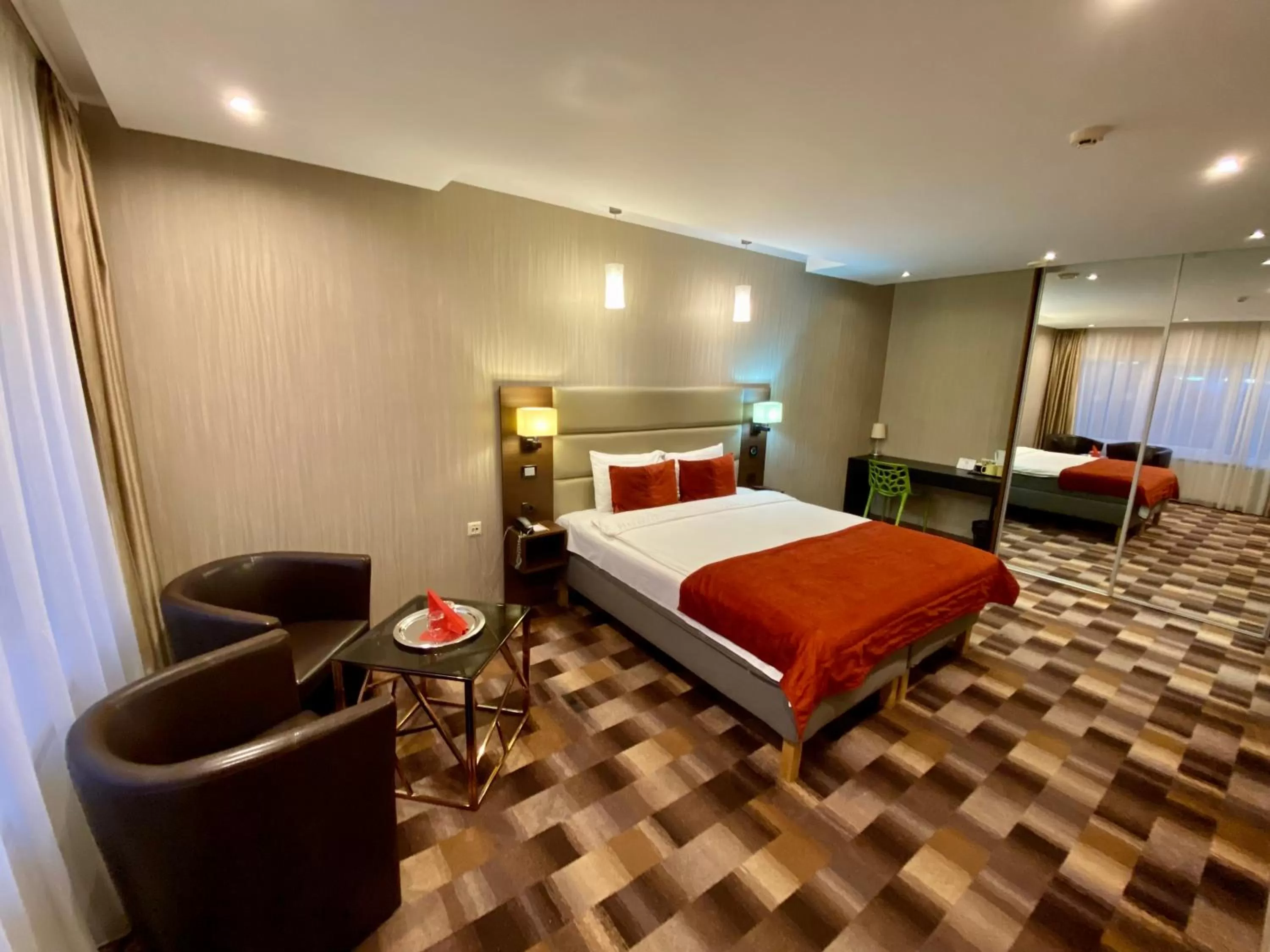 Bedroom in Olympus Hotel