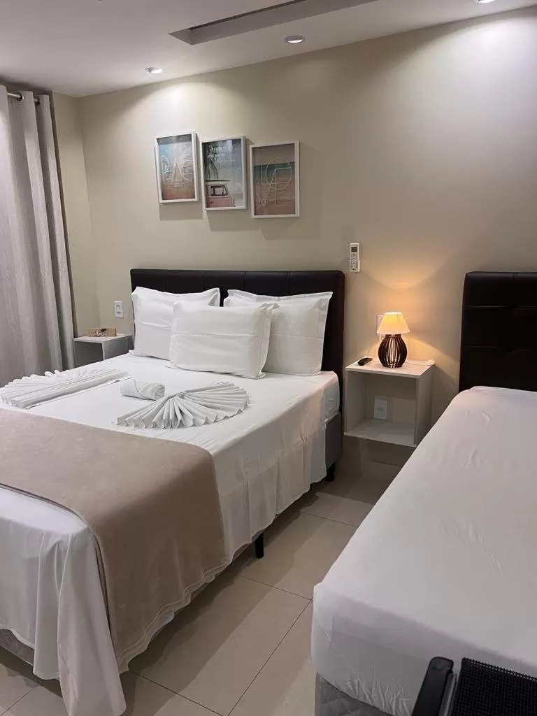 Bed in Pousada Arraial Tropical