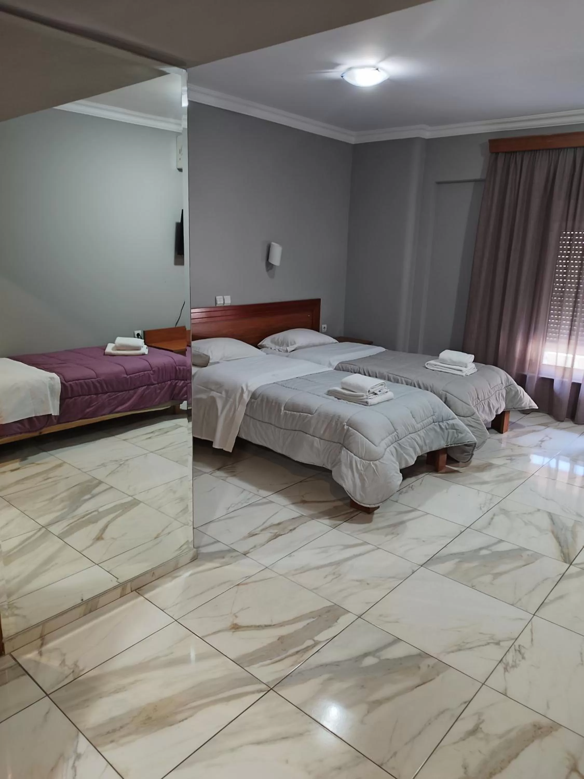 Triple Room in Piraeus Acropole Hotel