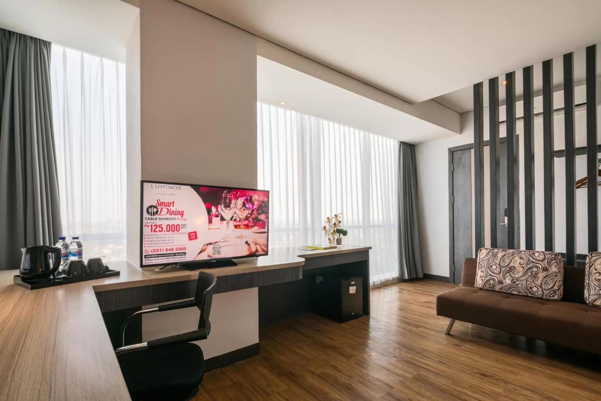 Photo of the whole room in Luminor Hotel Jemursari By WH with The Best Breakfast in Town and Located Near Surabaya Industrial Estate Rungkut SIER