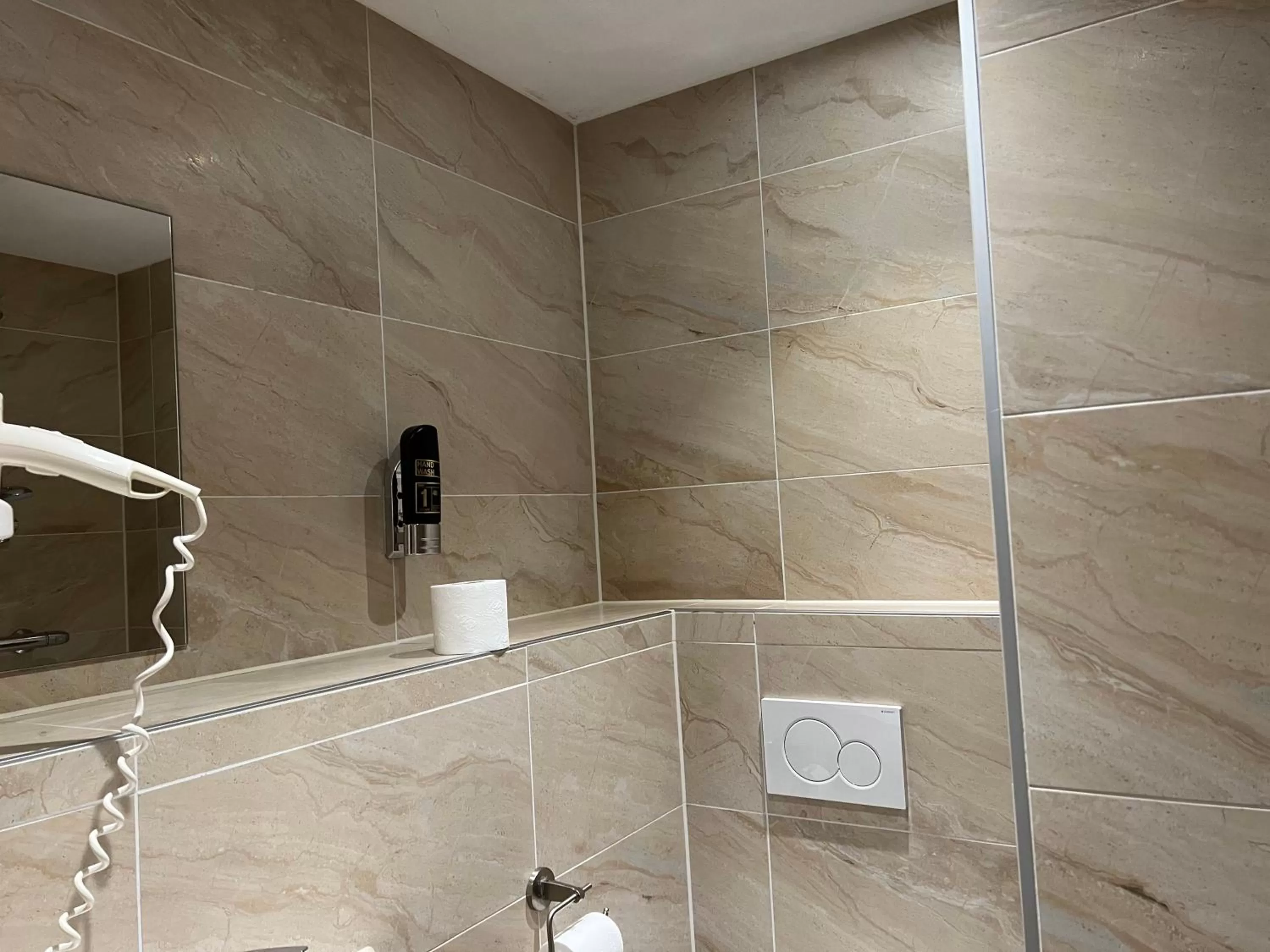 Bathroom in Blossoms City Hotel