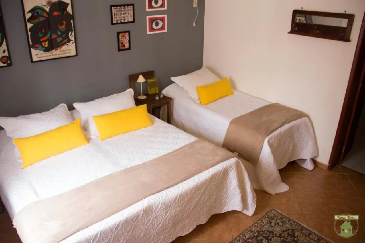 Bed in Pousada Nossa Terra