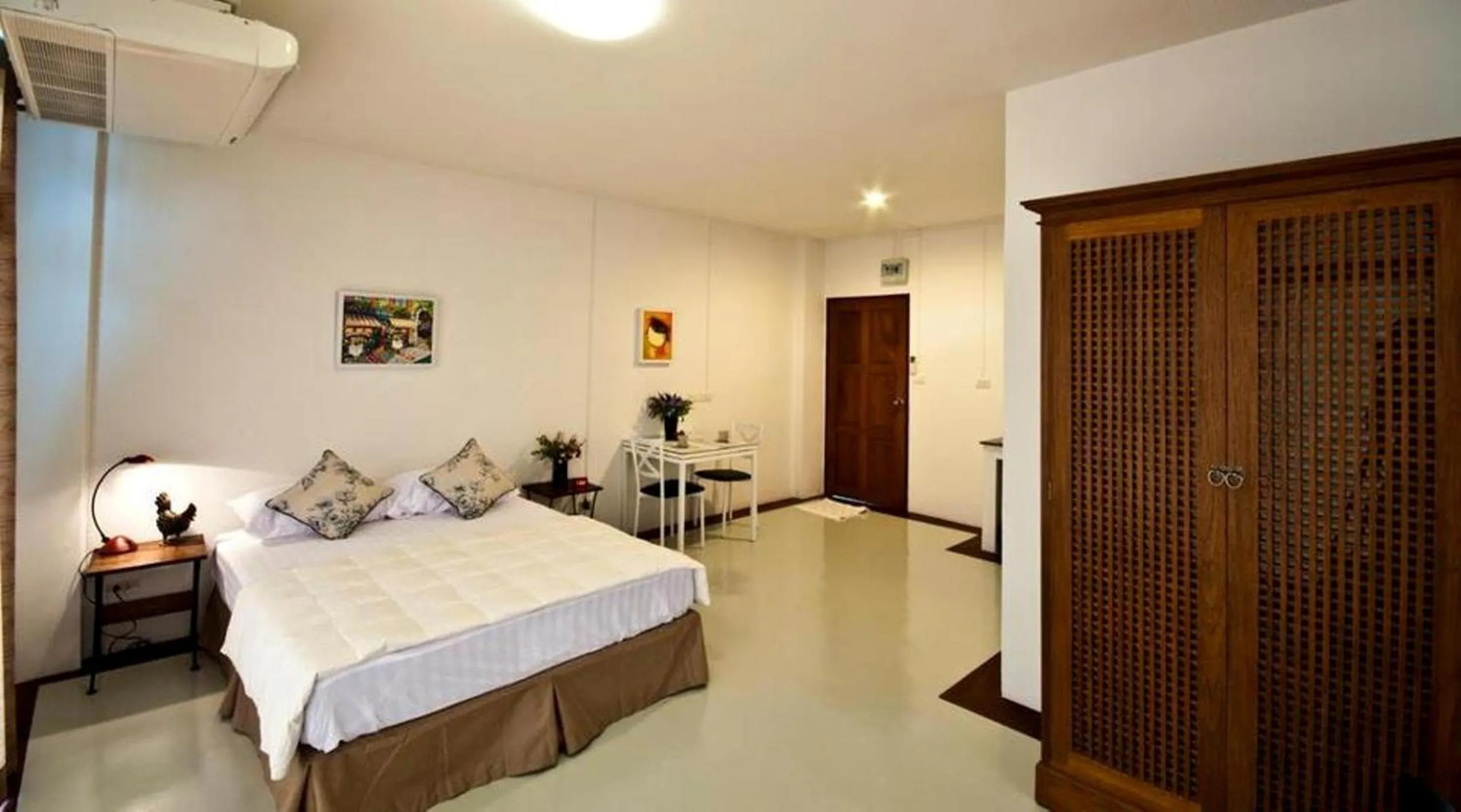 Bed in The Meet Green Apartment