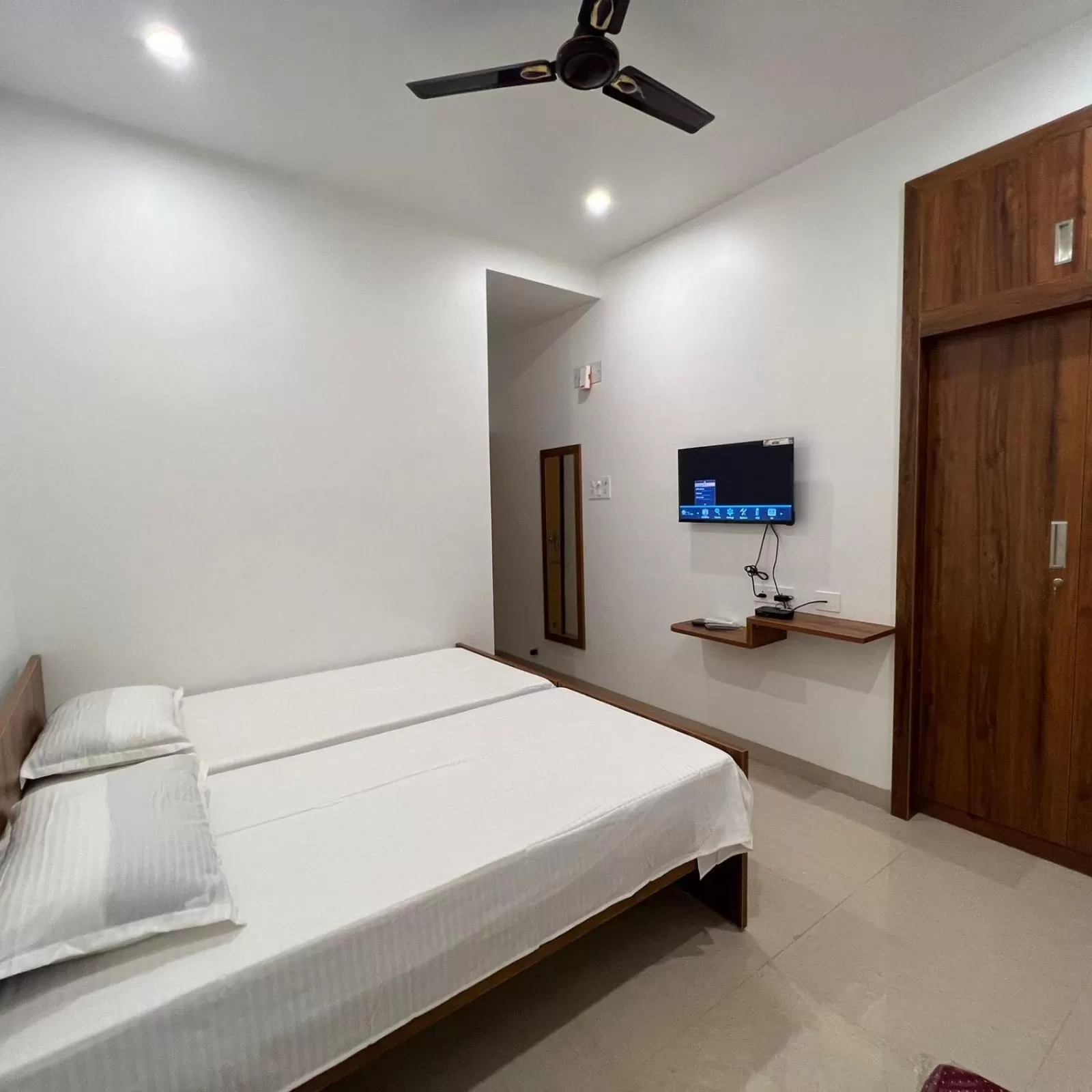 Photo of the whole room, Bed in MVP Residencies