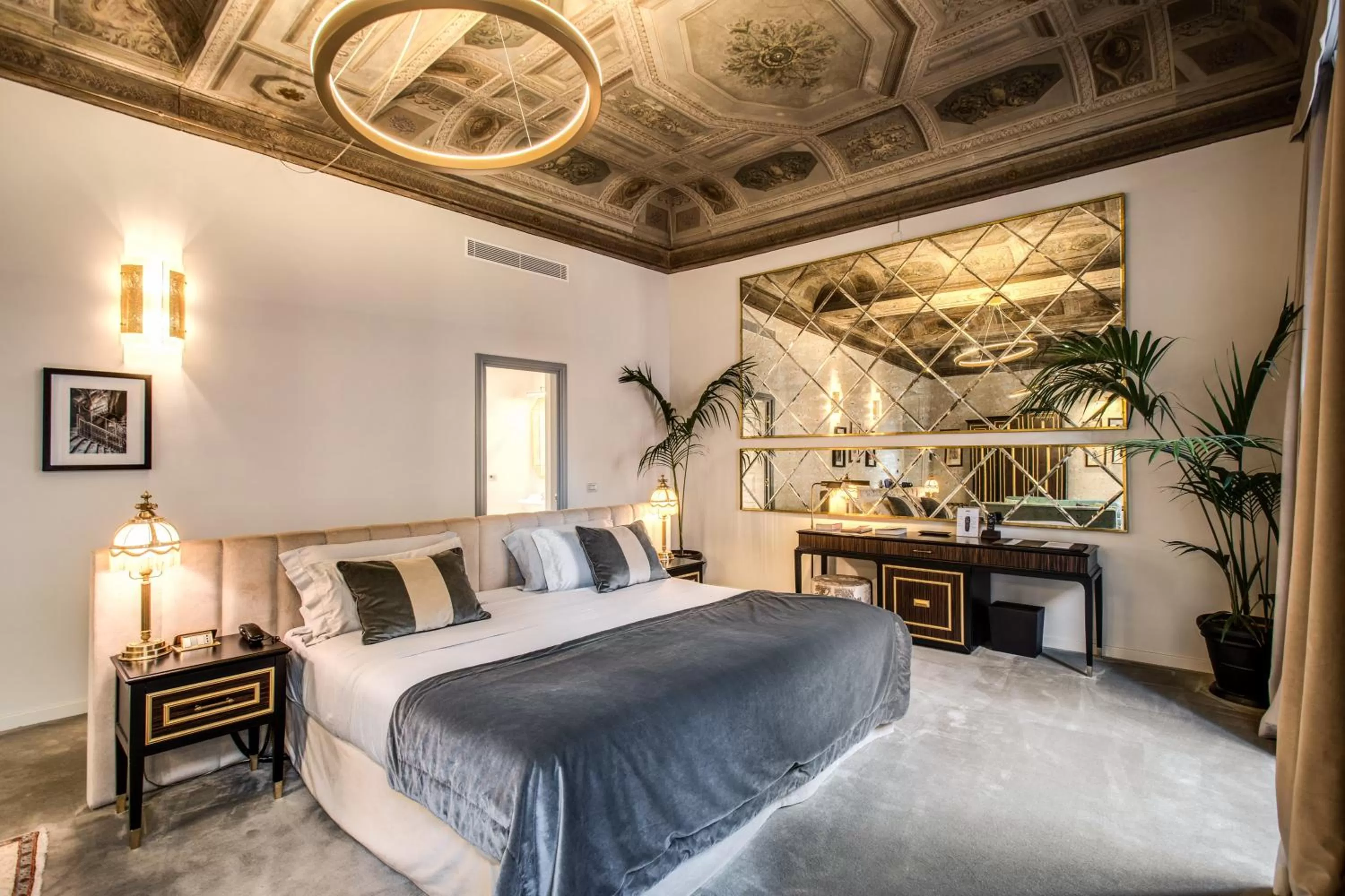 Bed in Martius Private Suites Hotel