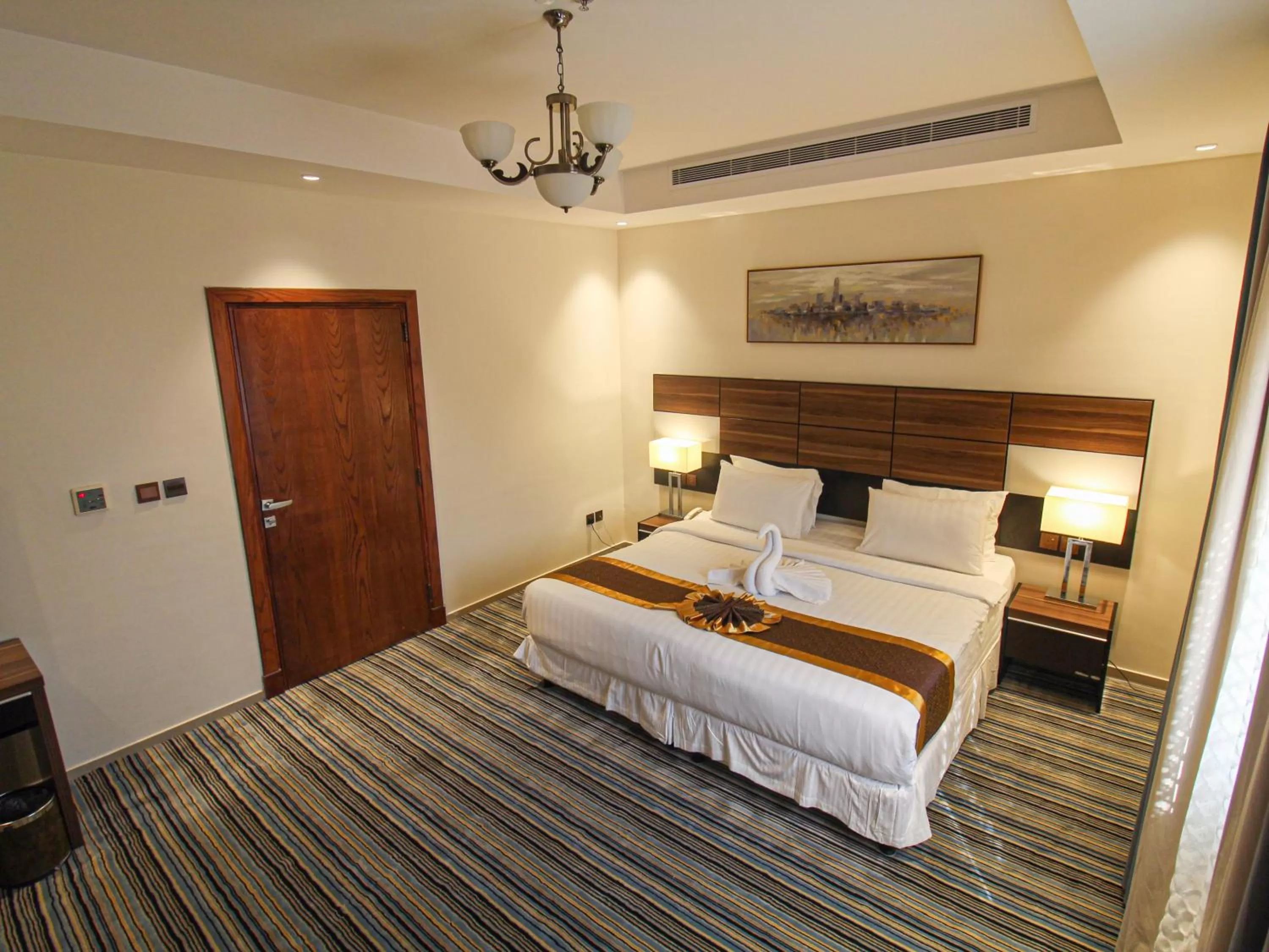 Bed in Friesian Hotel Suites