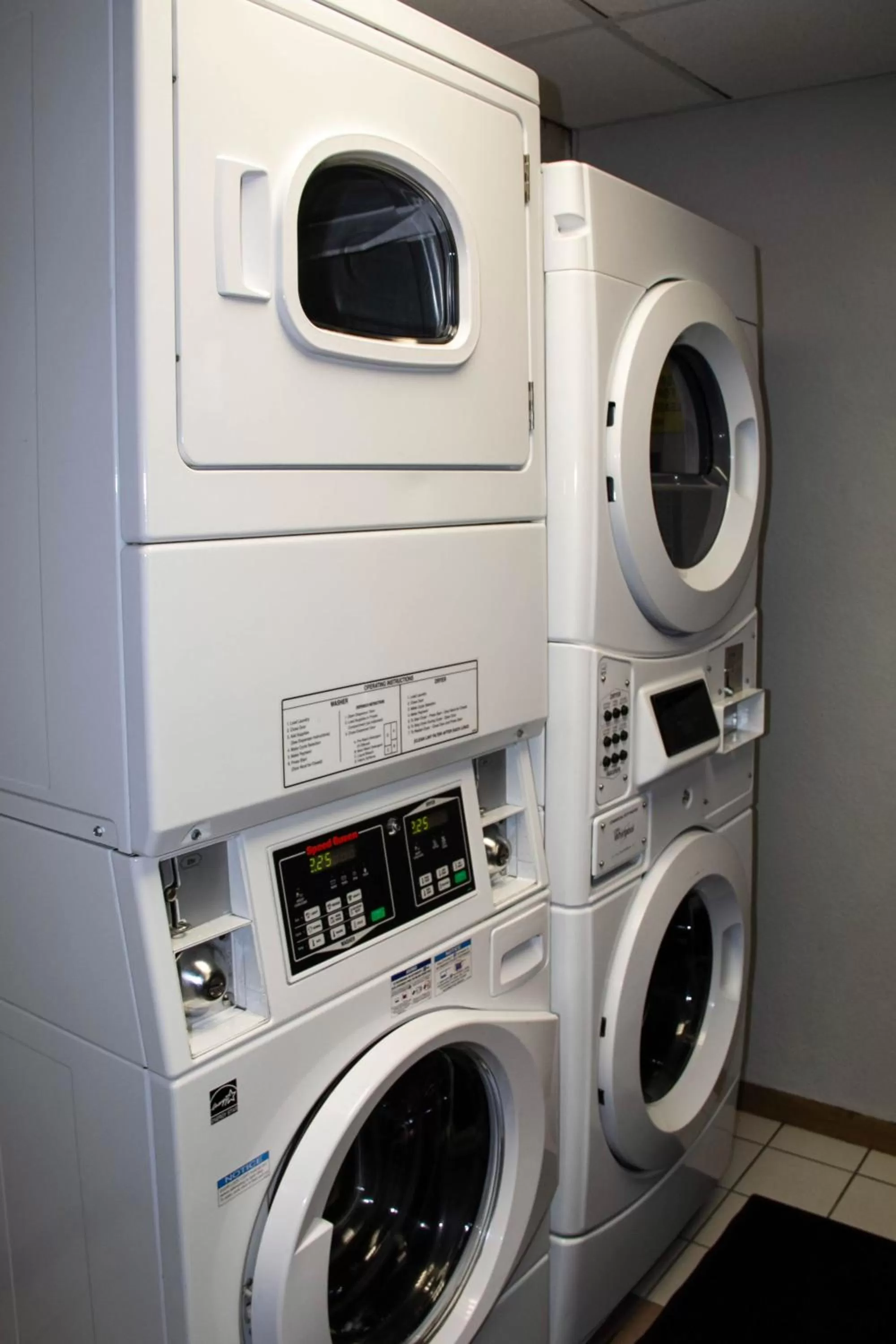 washing machine in New Victorian Inn & Suites-Norfolk