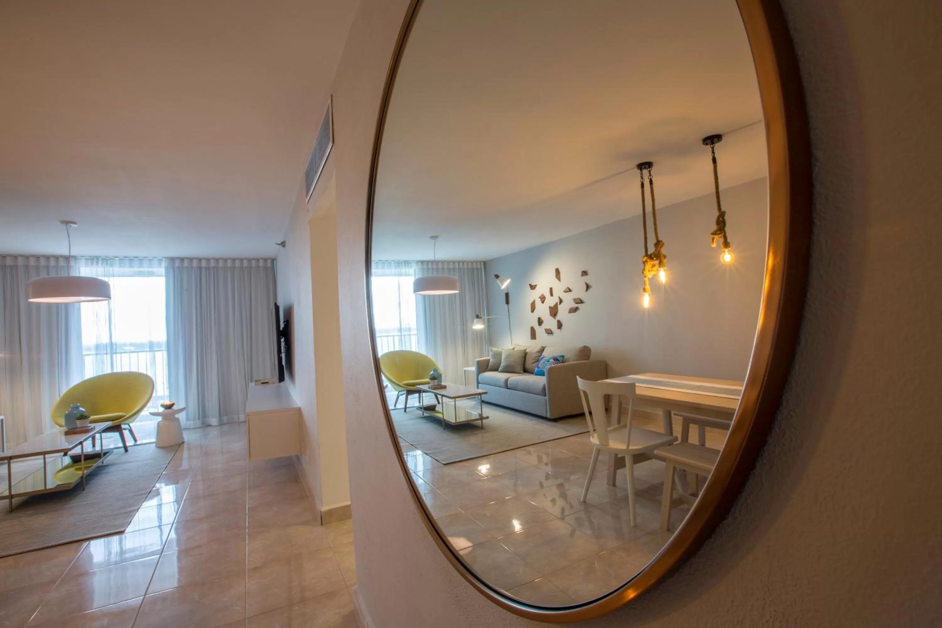 Living room in OCEAN VIEW DELUXE SUITE: PVT. BEACH & POOL