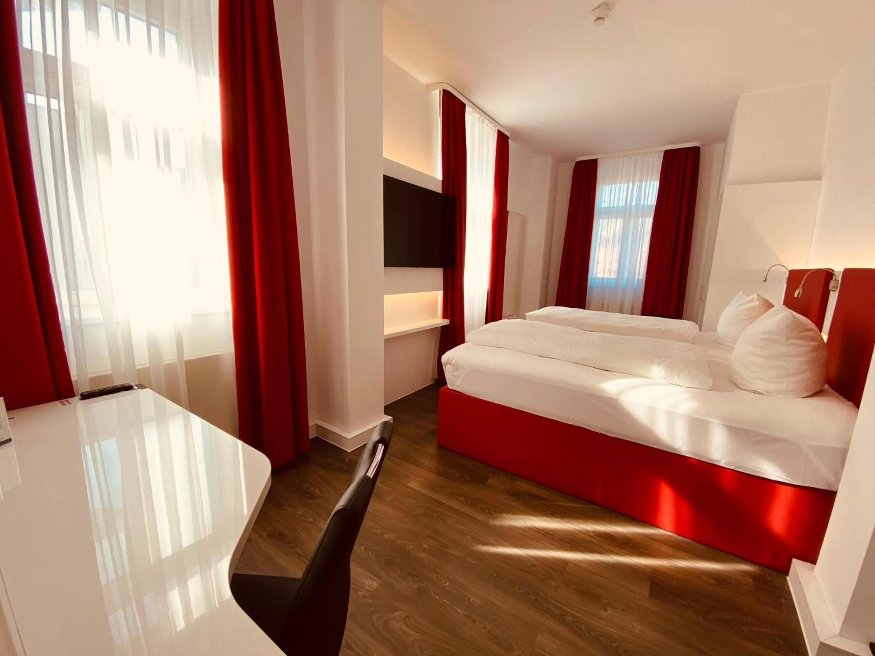 Bathroom, Bed in DORMERO Hotel Dresden City