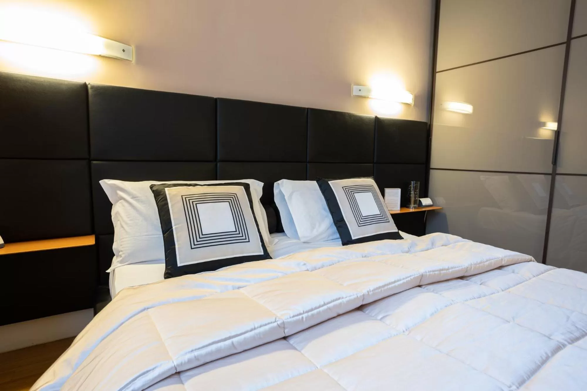 Bed in Cardilli Luxury Rooms