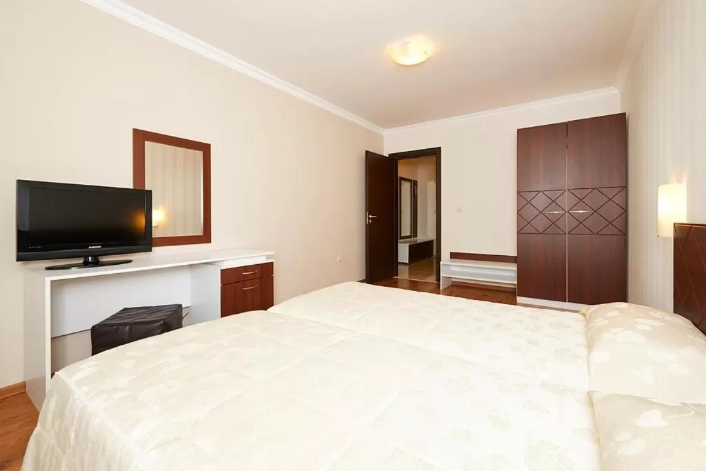 Bed in Penelopa Palace Apart Hotel & SPA