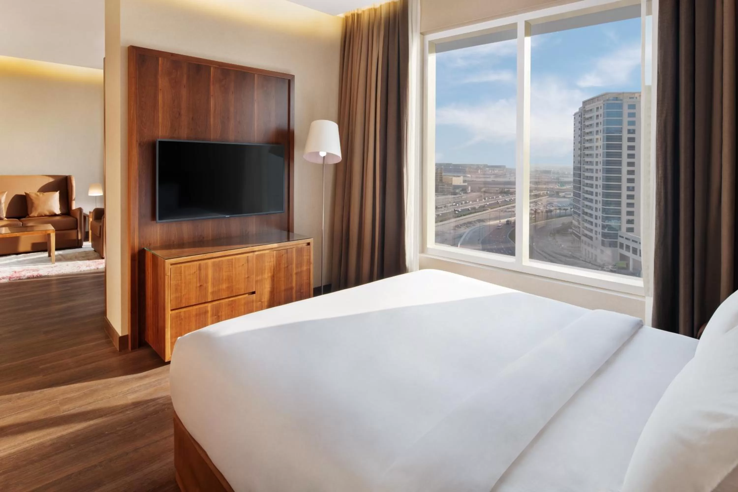 TV and multimedia, Bed in Radisson Blu Hotel, Dubai Canal View