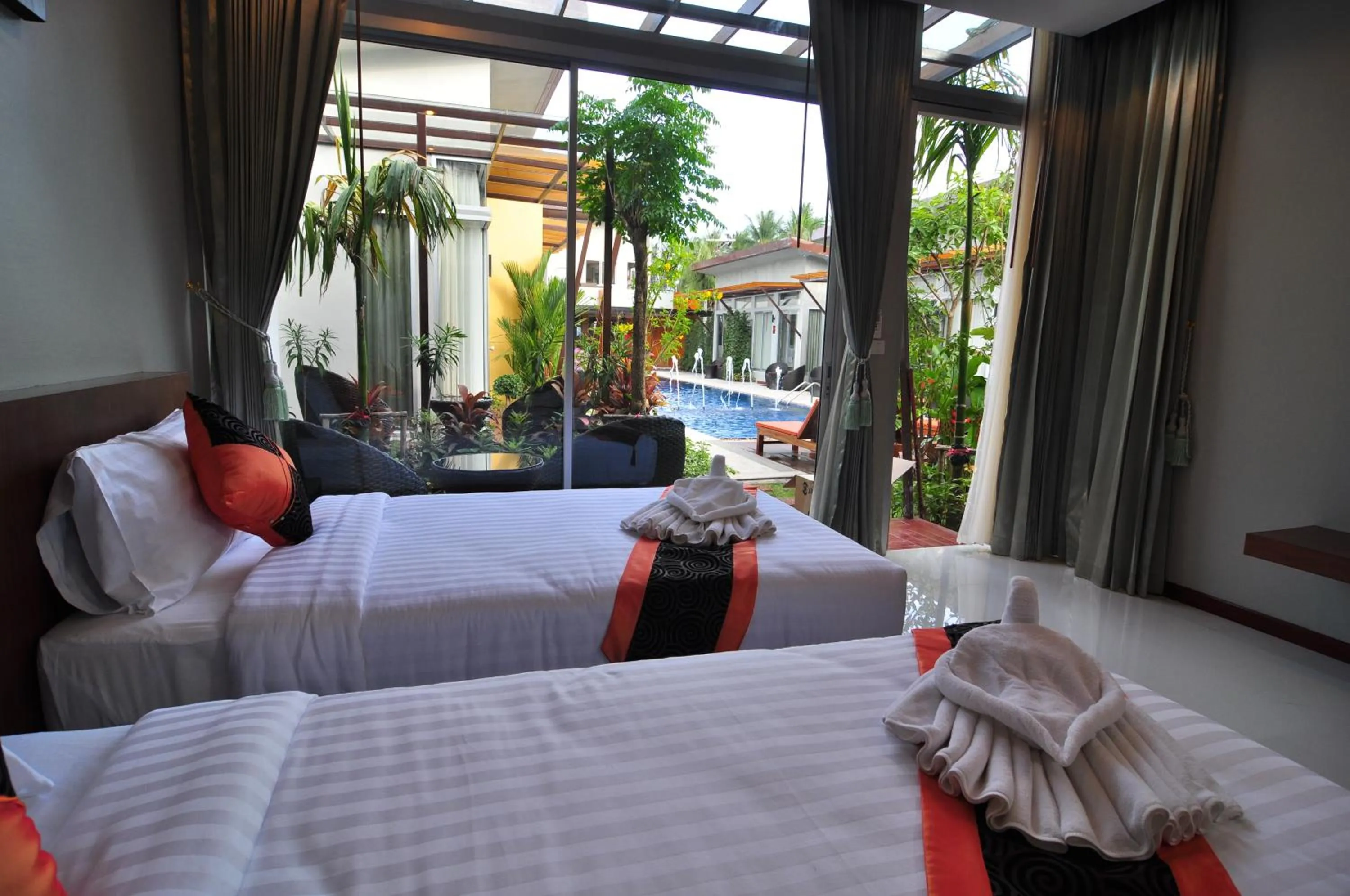 Bed in Phu NaNa Boutique Hotel - SHA Plus