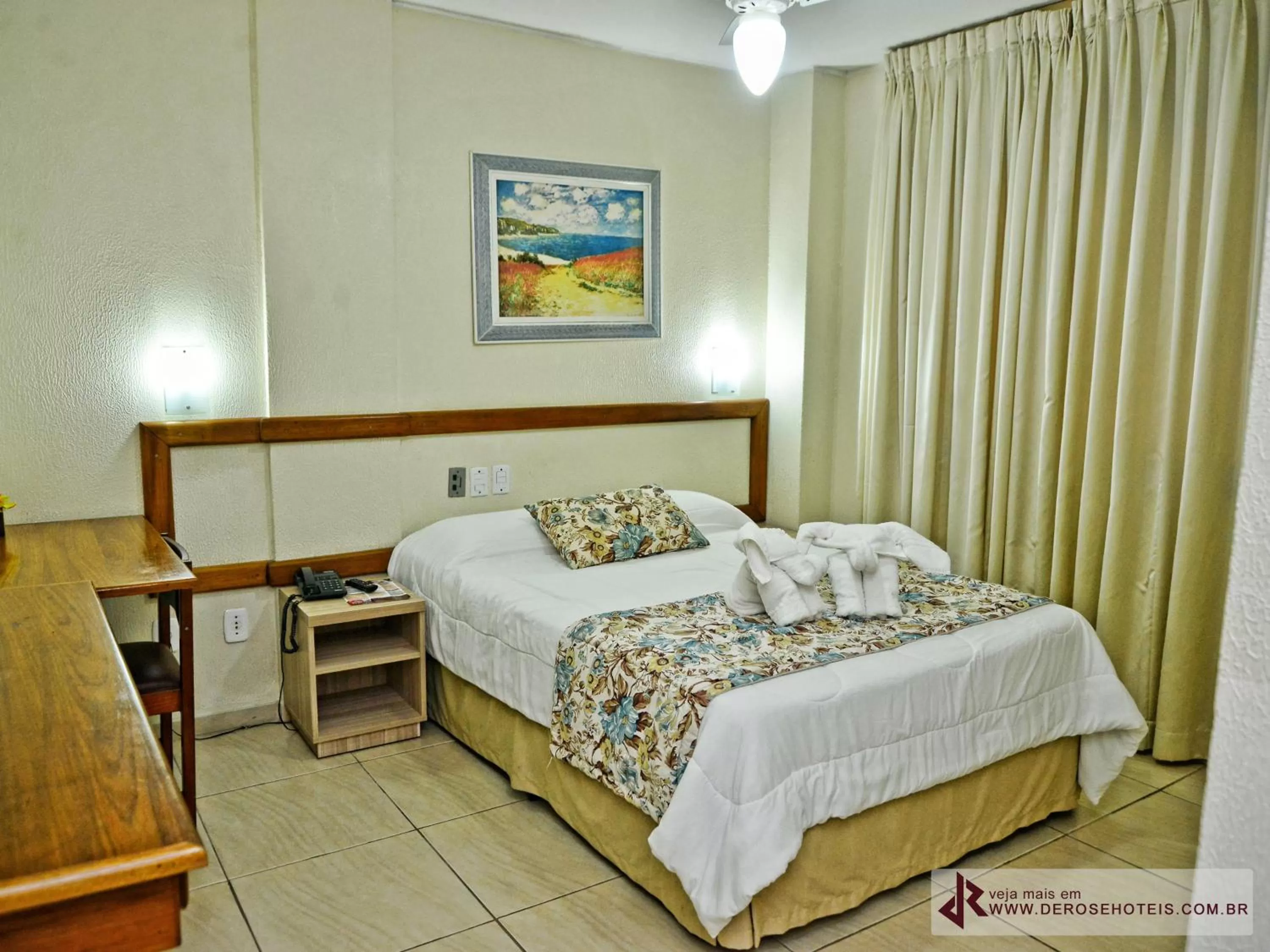 Bed in De Rose Palace Hotel