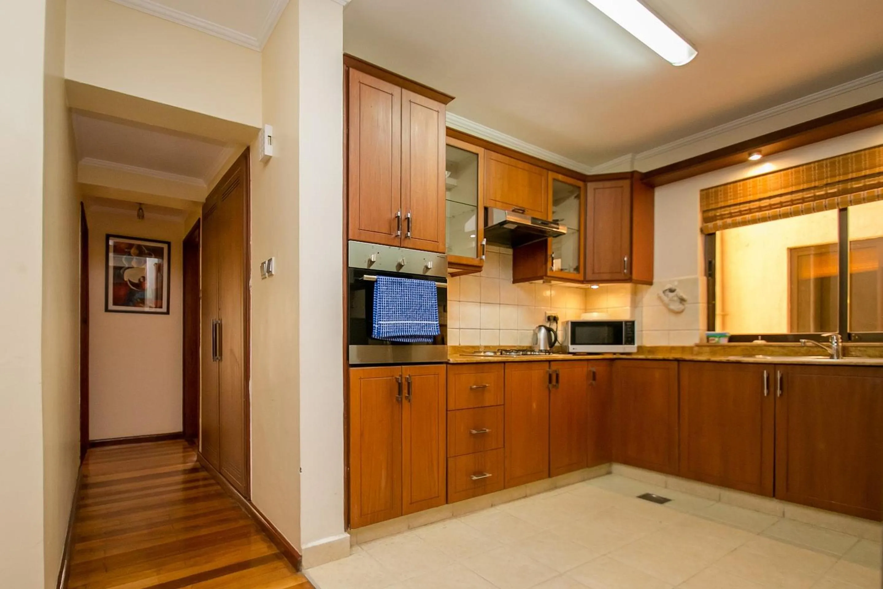 Kitchen or kitchenette in Waridi Paradise Hotel and Suites