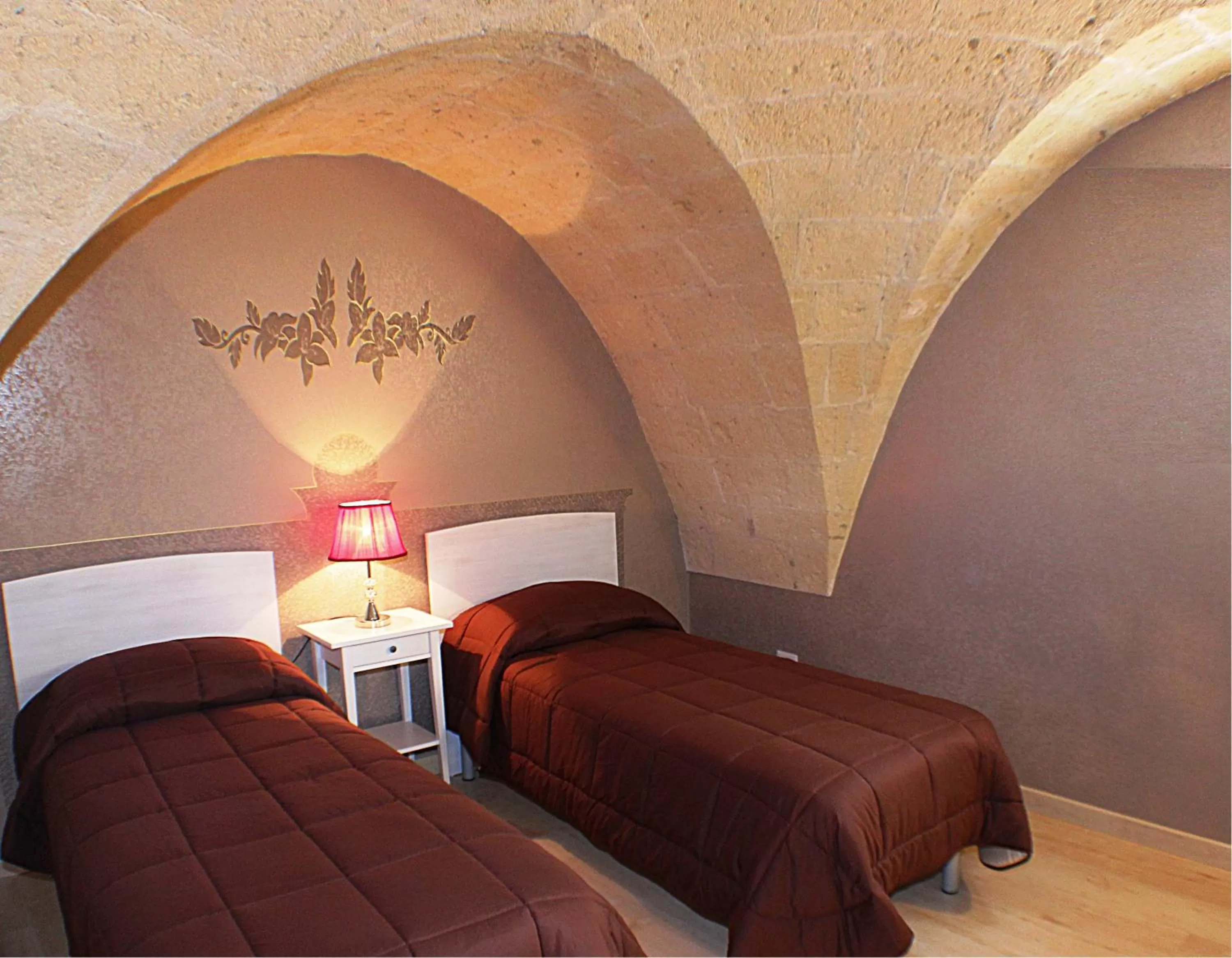 Decorative detail, Bed in B&B Duca Orsini