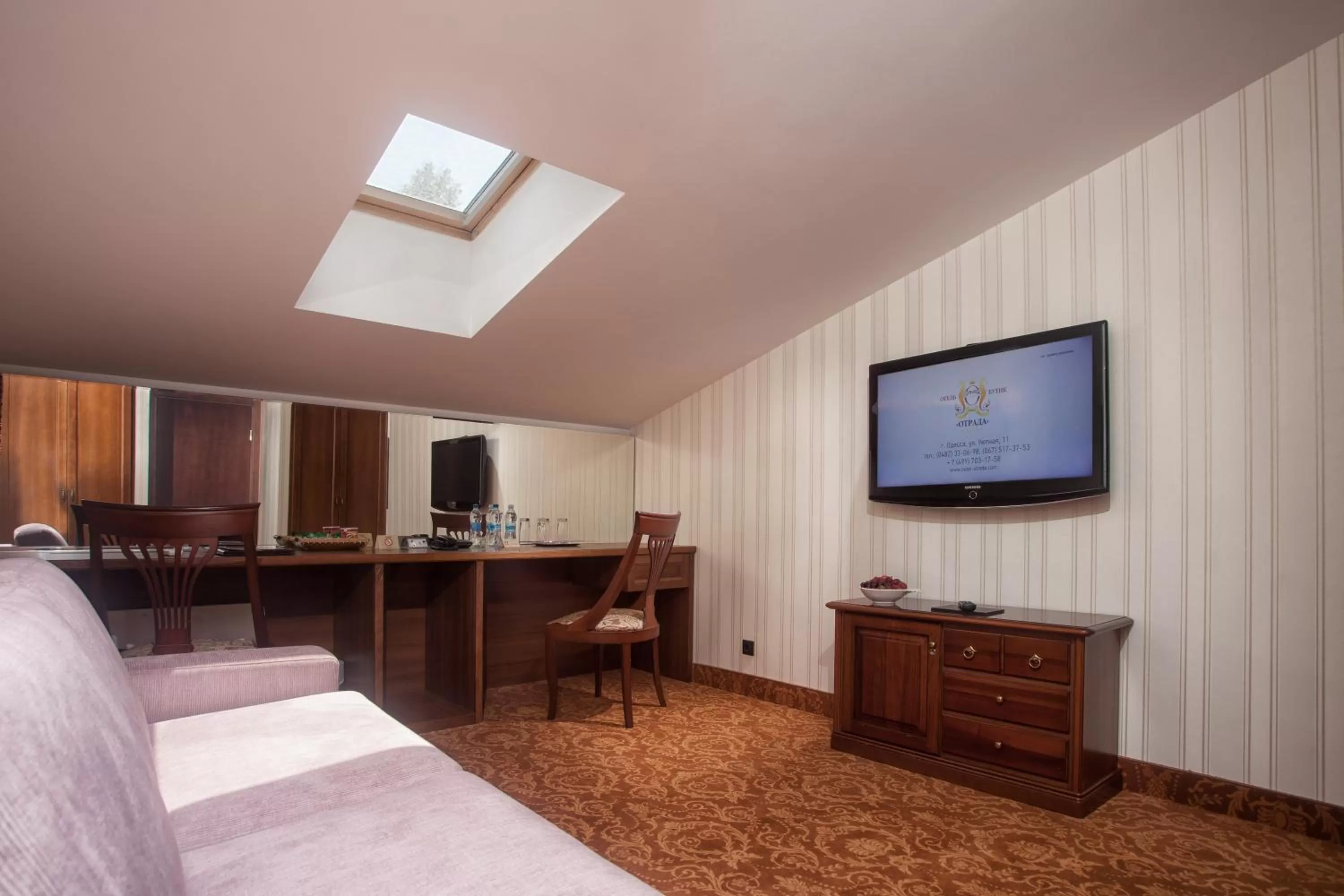 Living room, Bed in Hotel Otrada