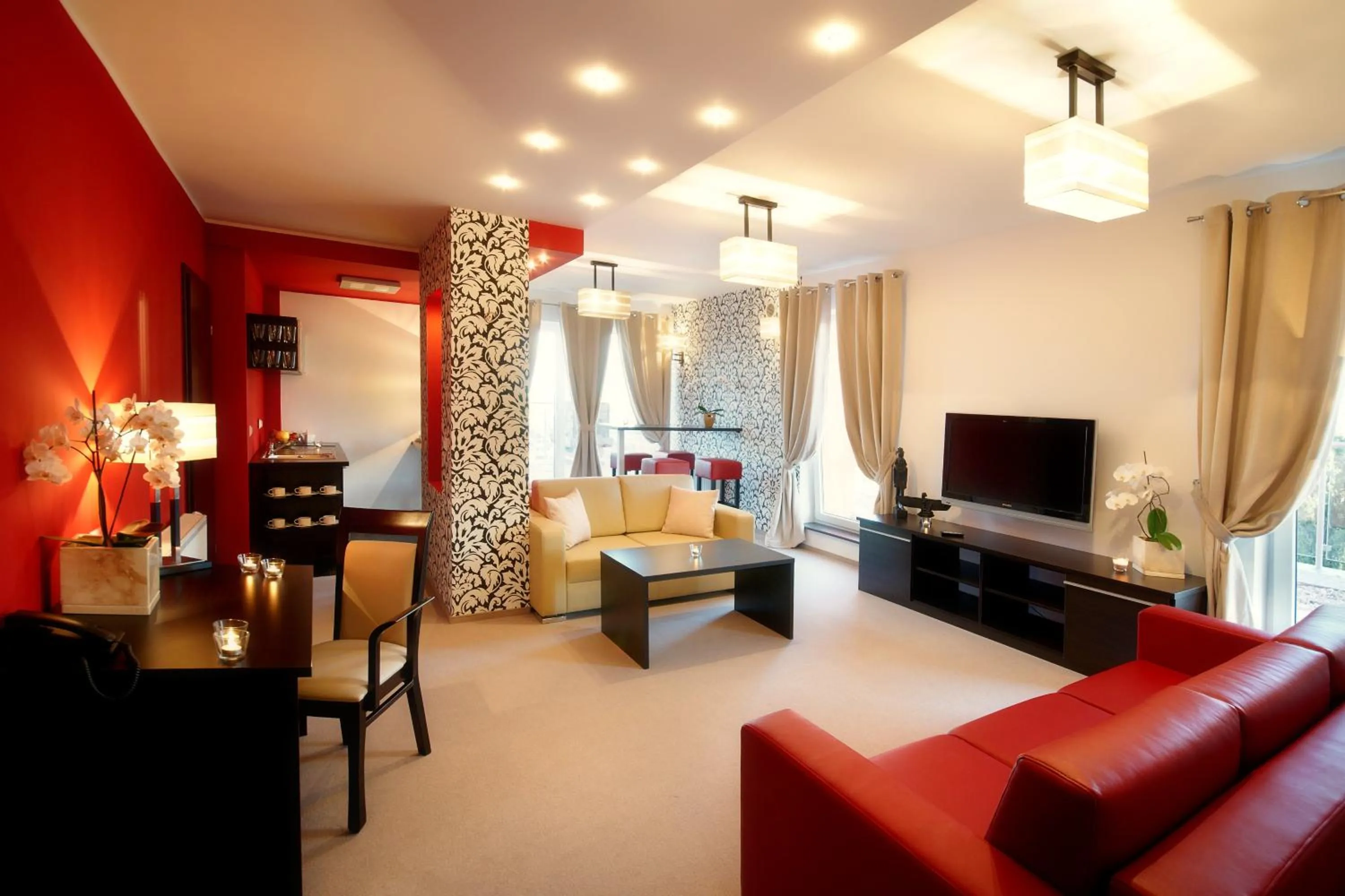 Living room, Bed in Hotton Hotel