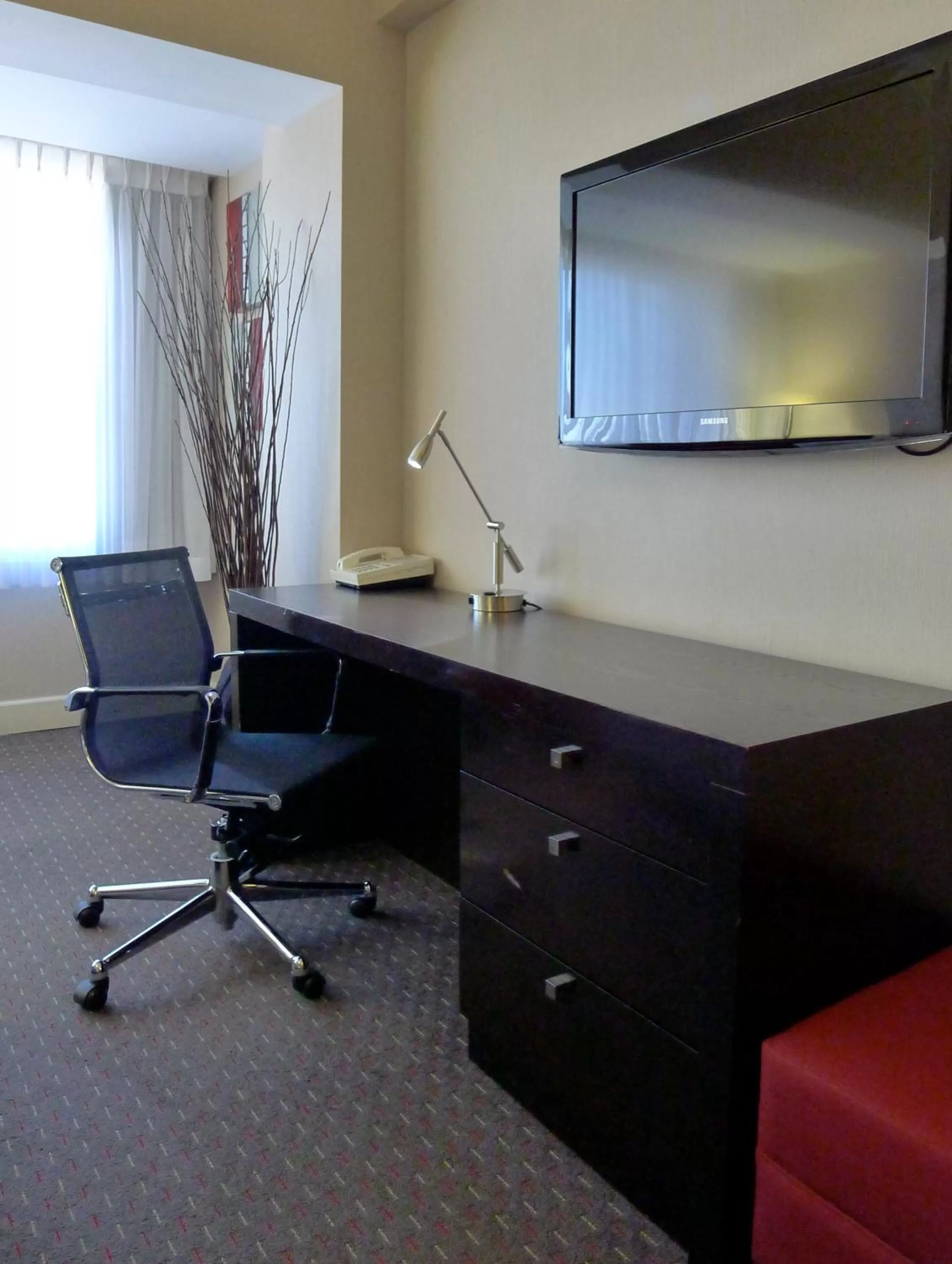 TV and multimedia in Armon Plaza Montreal Airpt, Trademark Collection by Wyndham