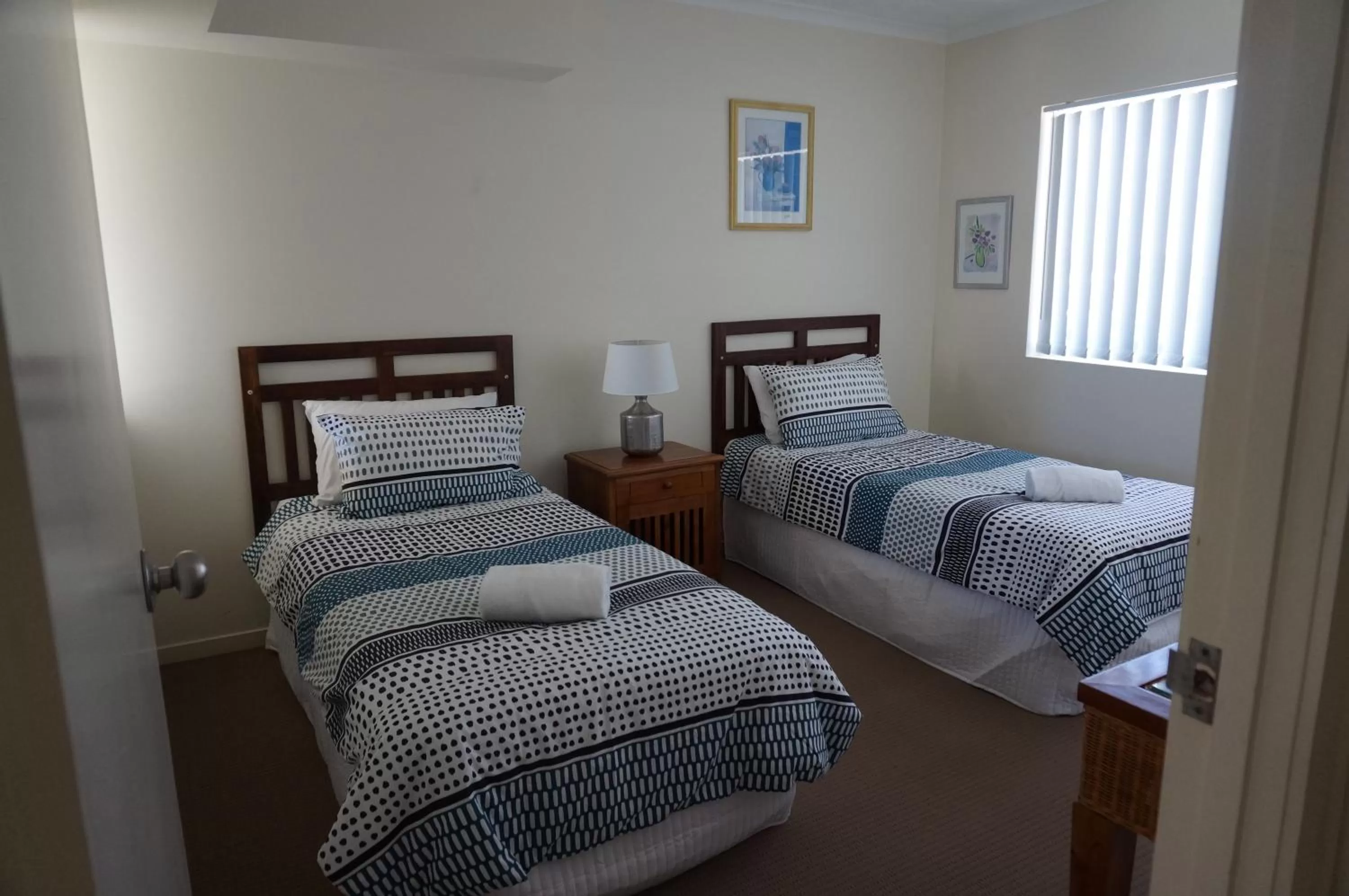 Bedroom, Bed in Moorings Beach Resort