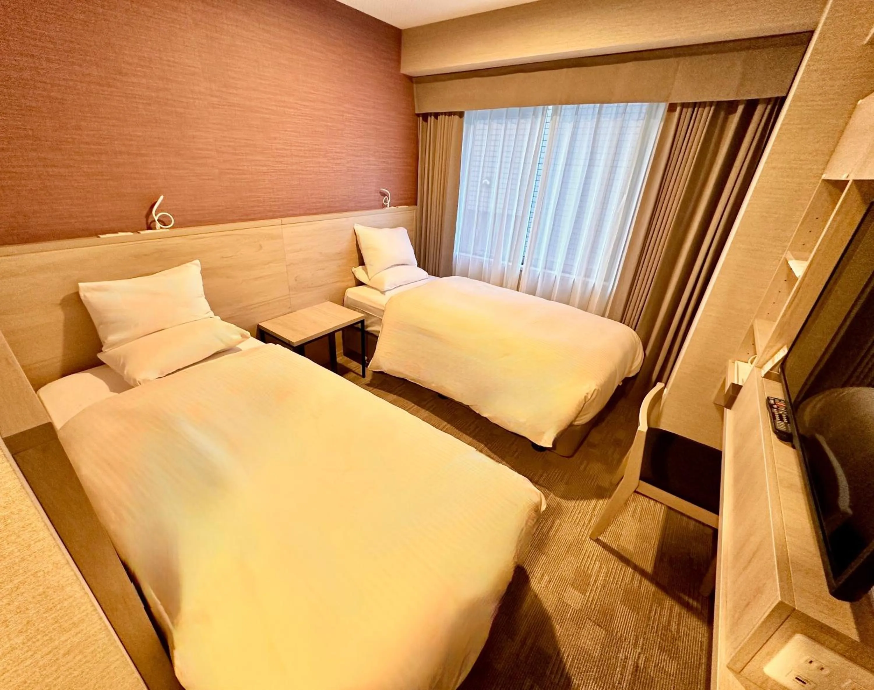 Bed in Hotel Rose Garden Shinjuku