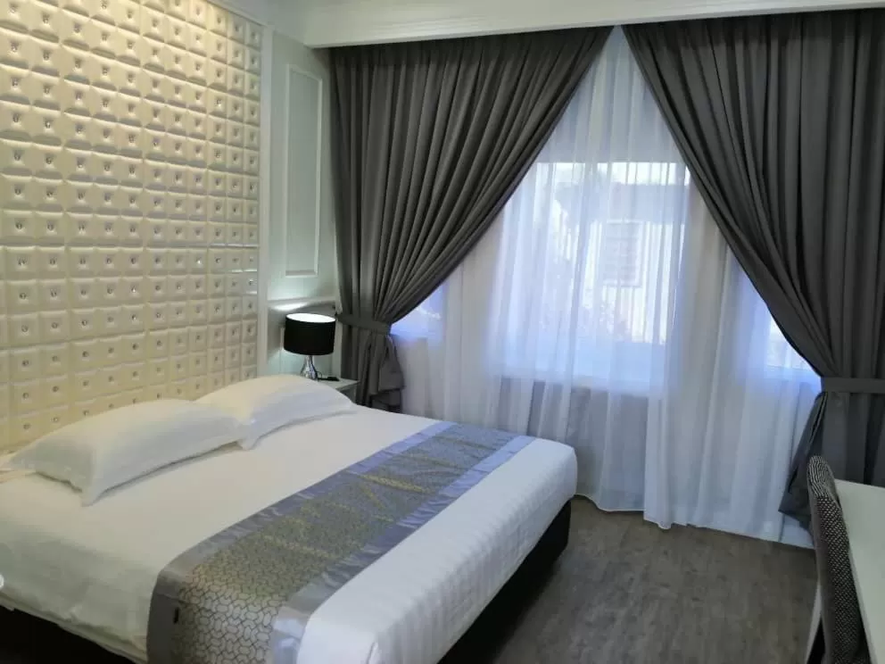 Bed in D'Village Resort Melaka