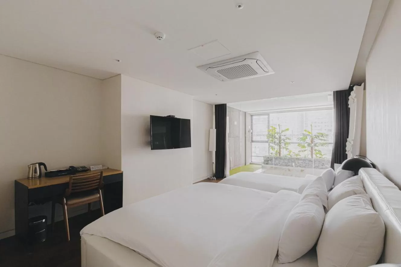 Bed in ACC Design Hotel