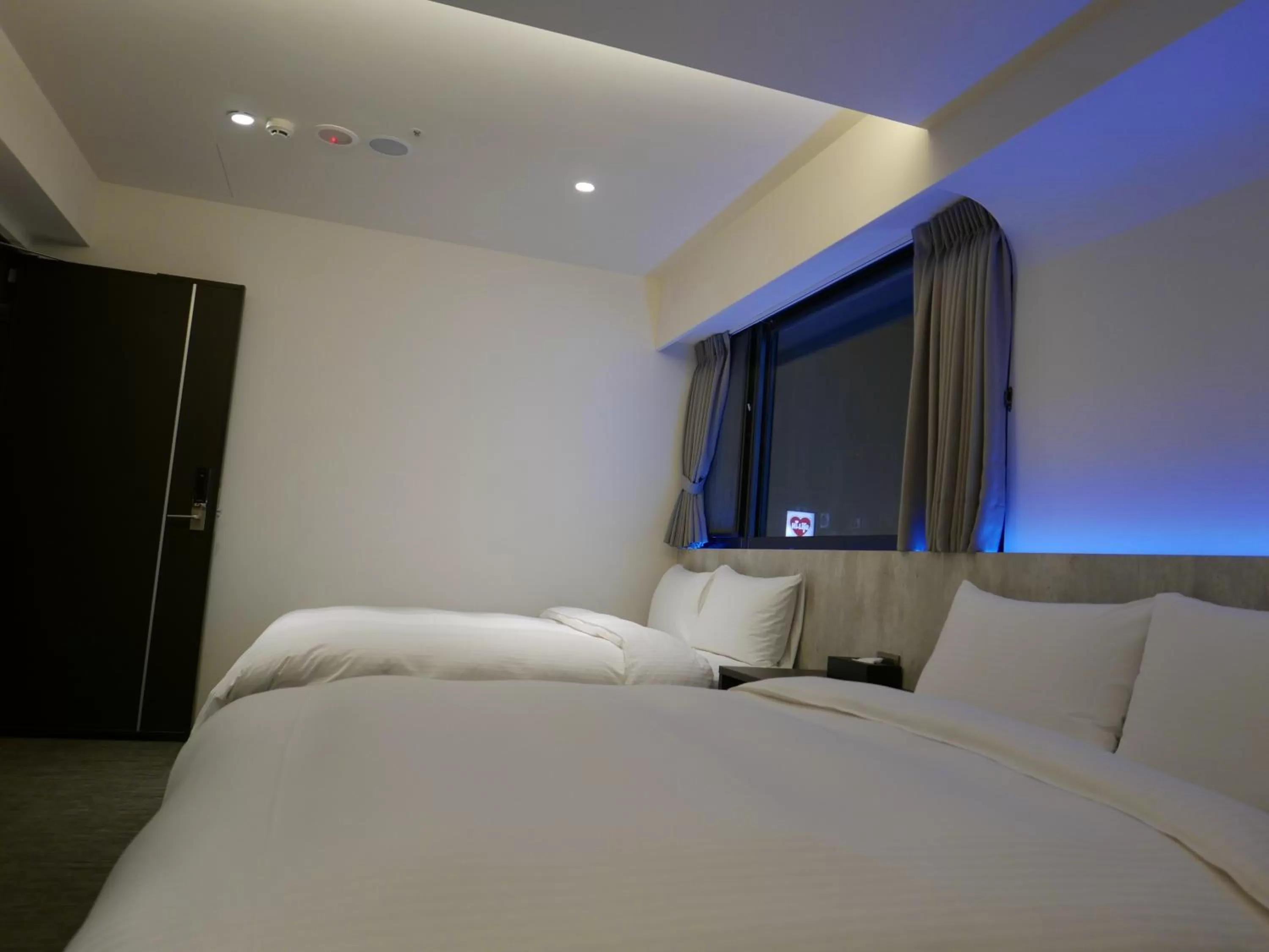 Bed in 泊居旅店二館 Oursinn Hotel 2