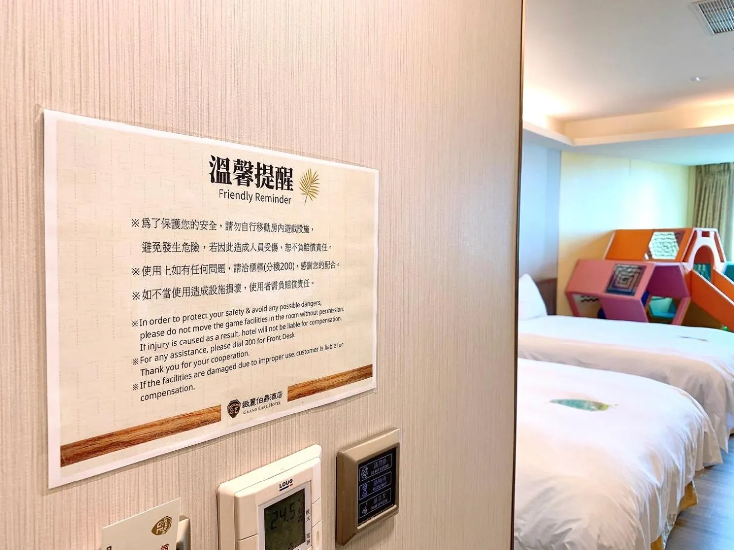 Bed in Grand Earl Hotel